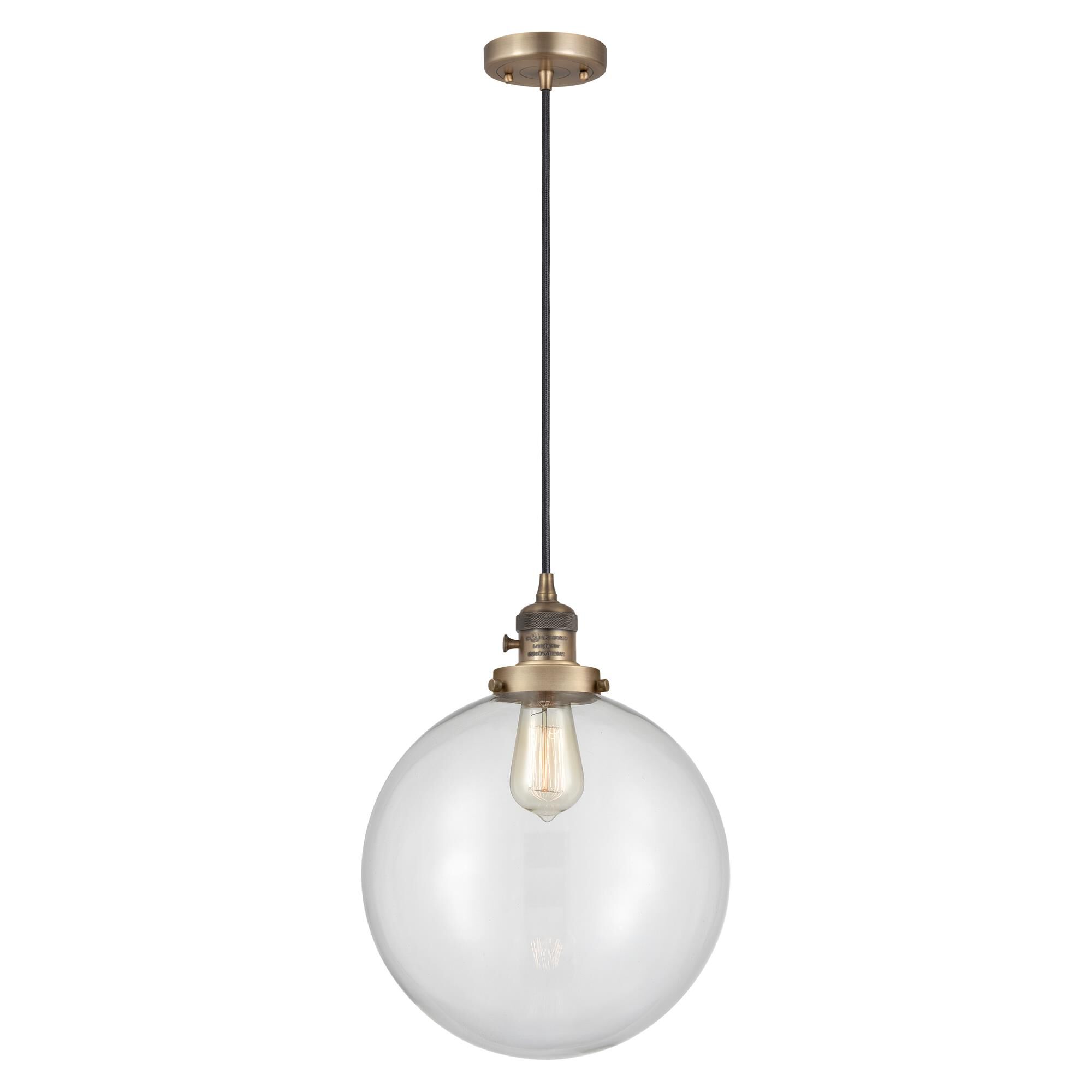 Shown in Brushed Brass finish and Clear glass