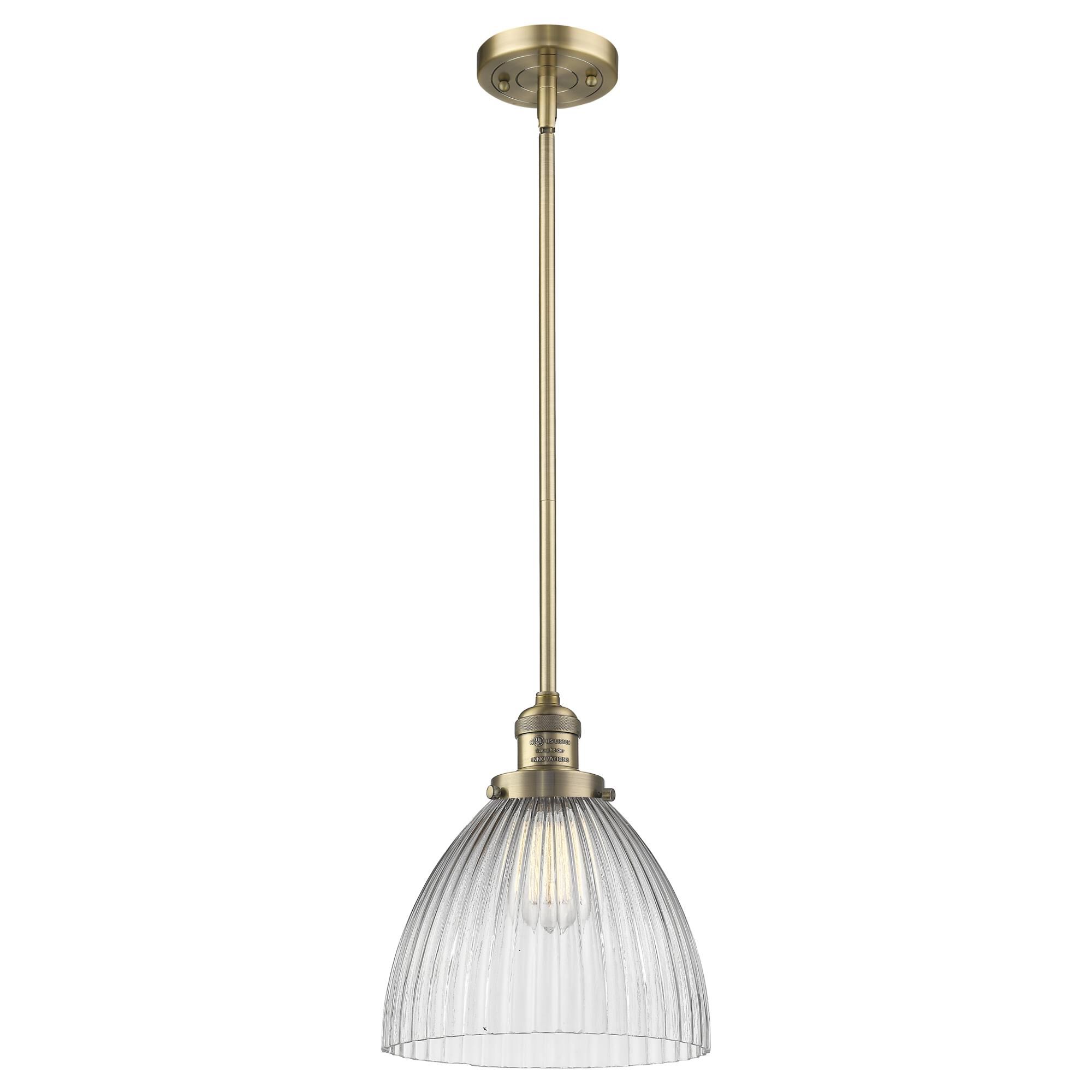 Shown in Brushed Brass finish and Clear Halophane glass