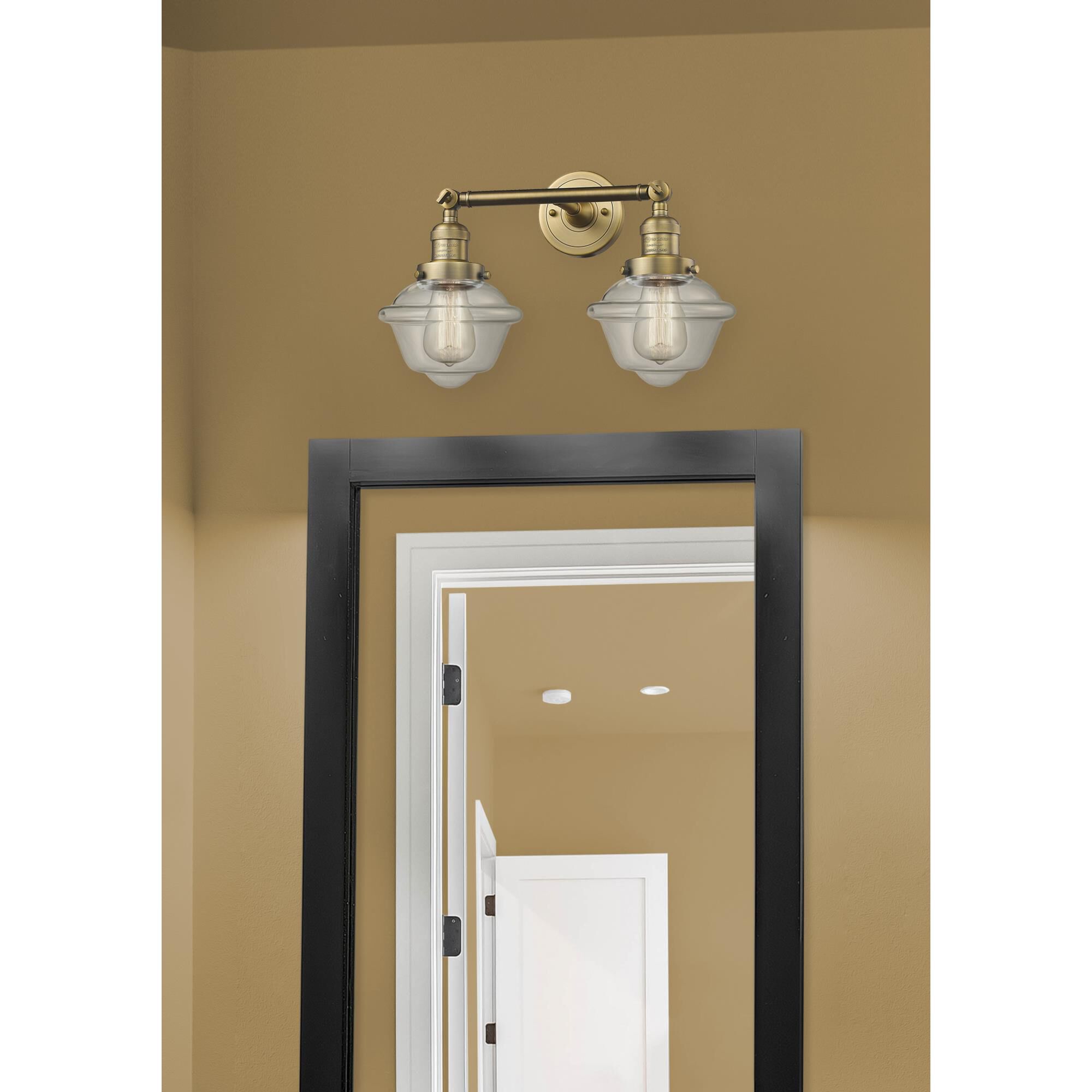 Shown in Brushed Brass finish and Clear glass