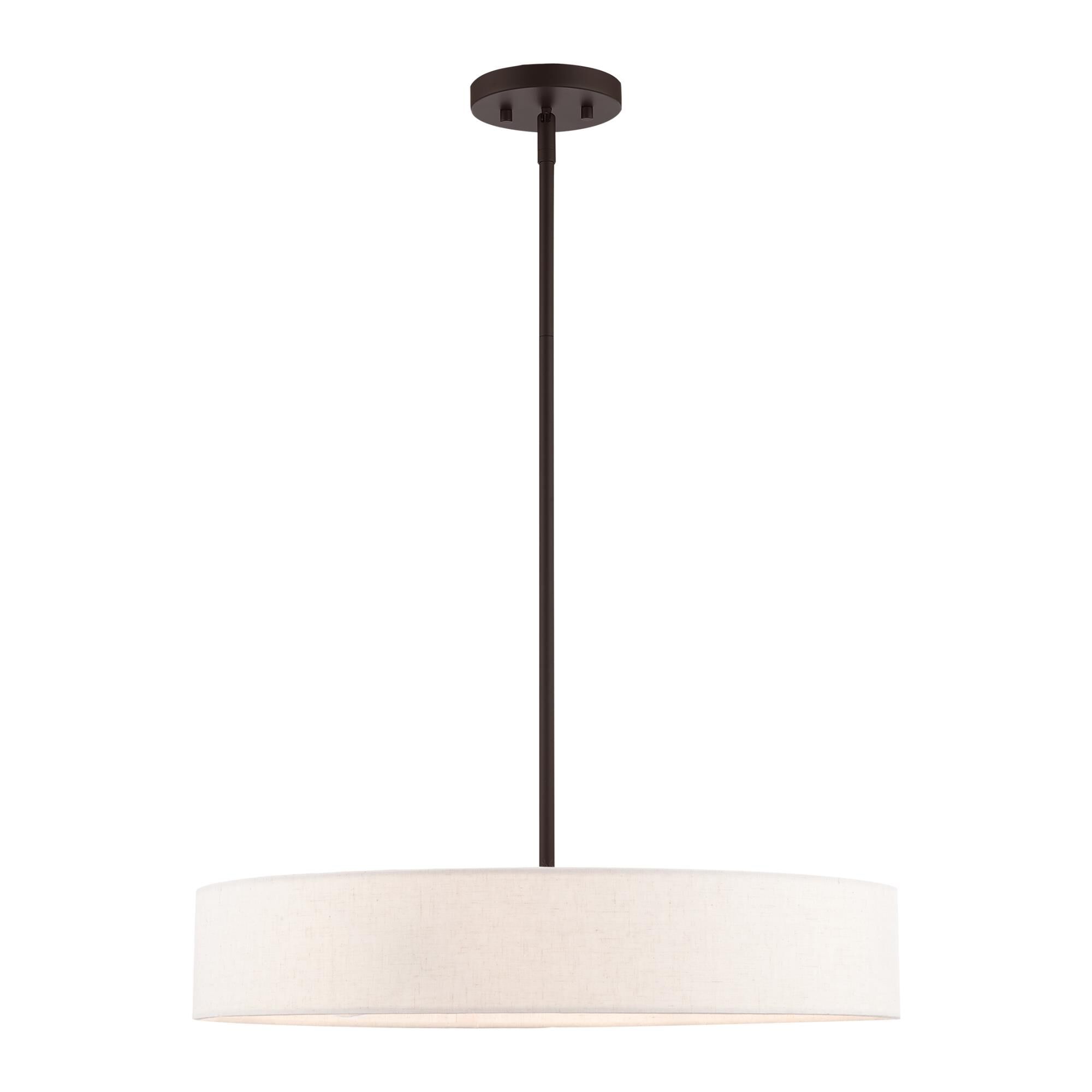 Shown in Bronze With Antique Brass Accents finish and Hand Crafted Oatmeal Fabric Hardback Shade glass and Hand Crafted Oatmeal Fabric Hardback shade