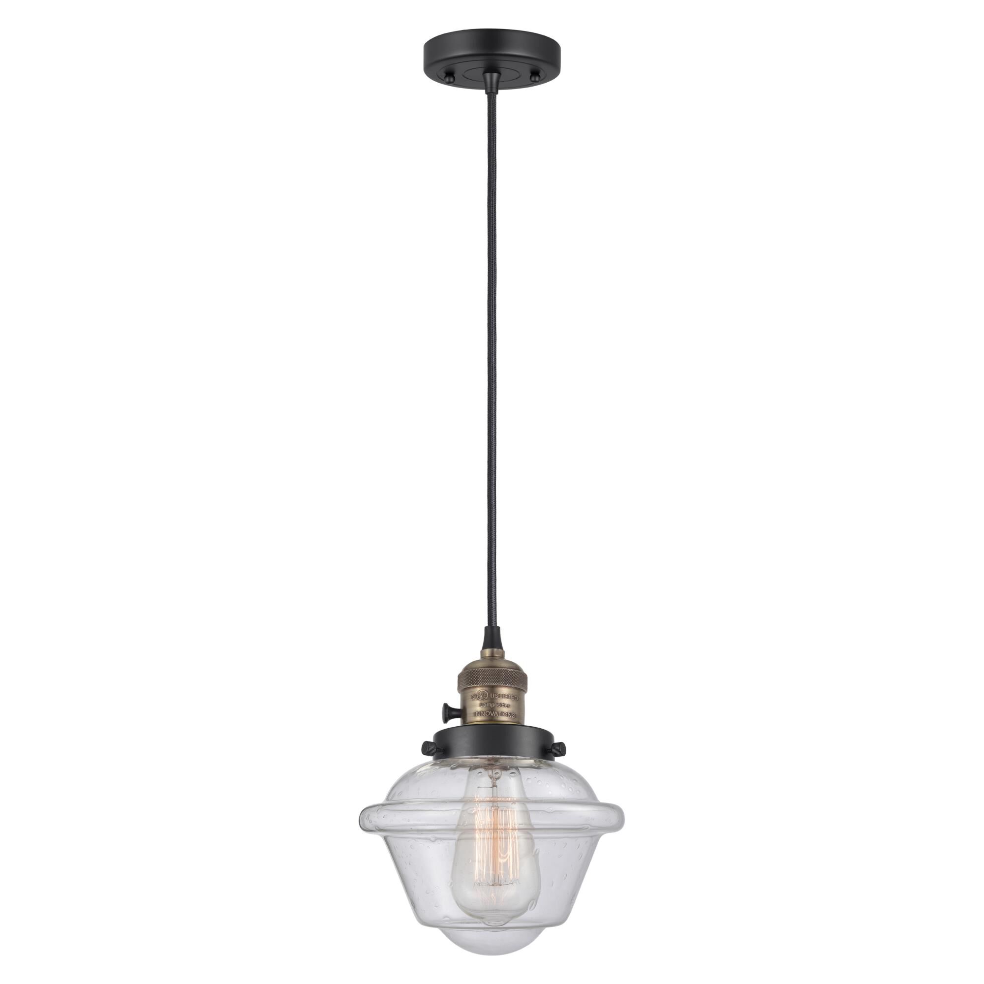 Shown in Black Antique Brass finish and Seedy glass