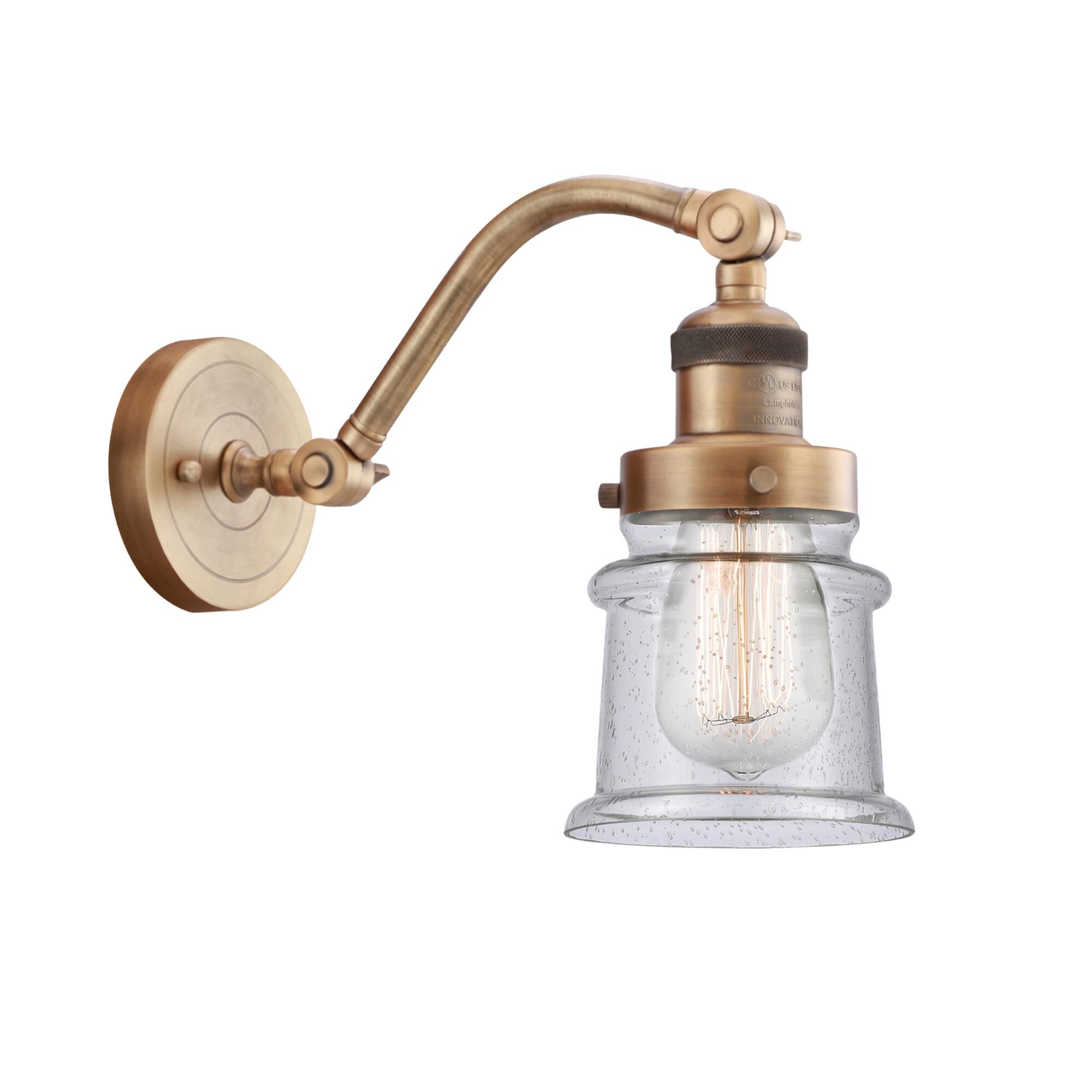 Shown in Brushed Brass finish and Seedy Canton glass