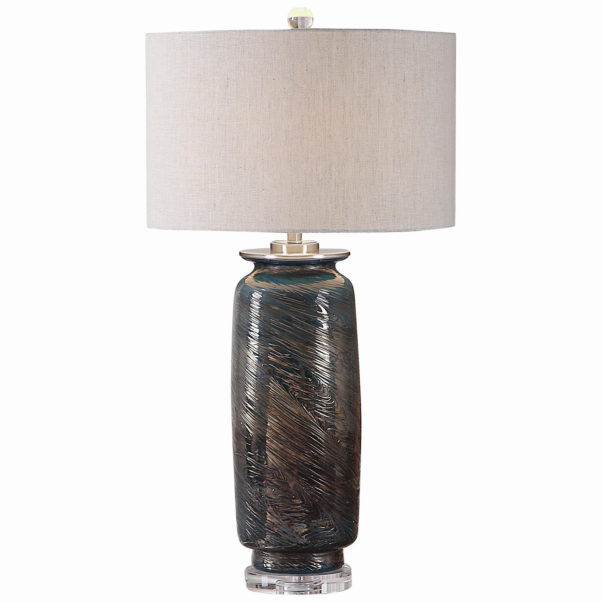 Shown in This Table Lamp Features A Decorative Glass Base That Showcases A Unique Swirl Texture, Highlighting finish and Round Hardback Drum shade