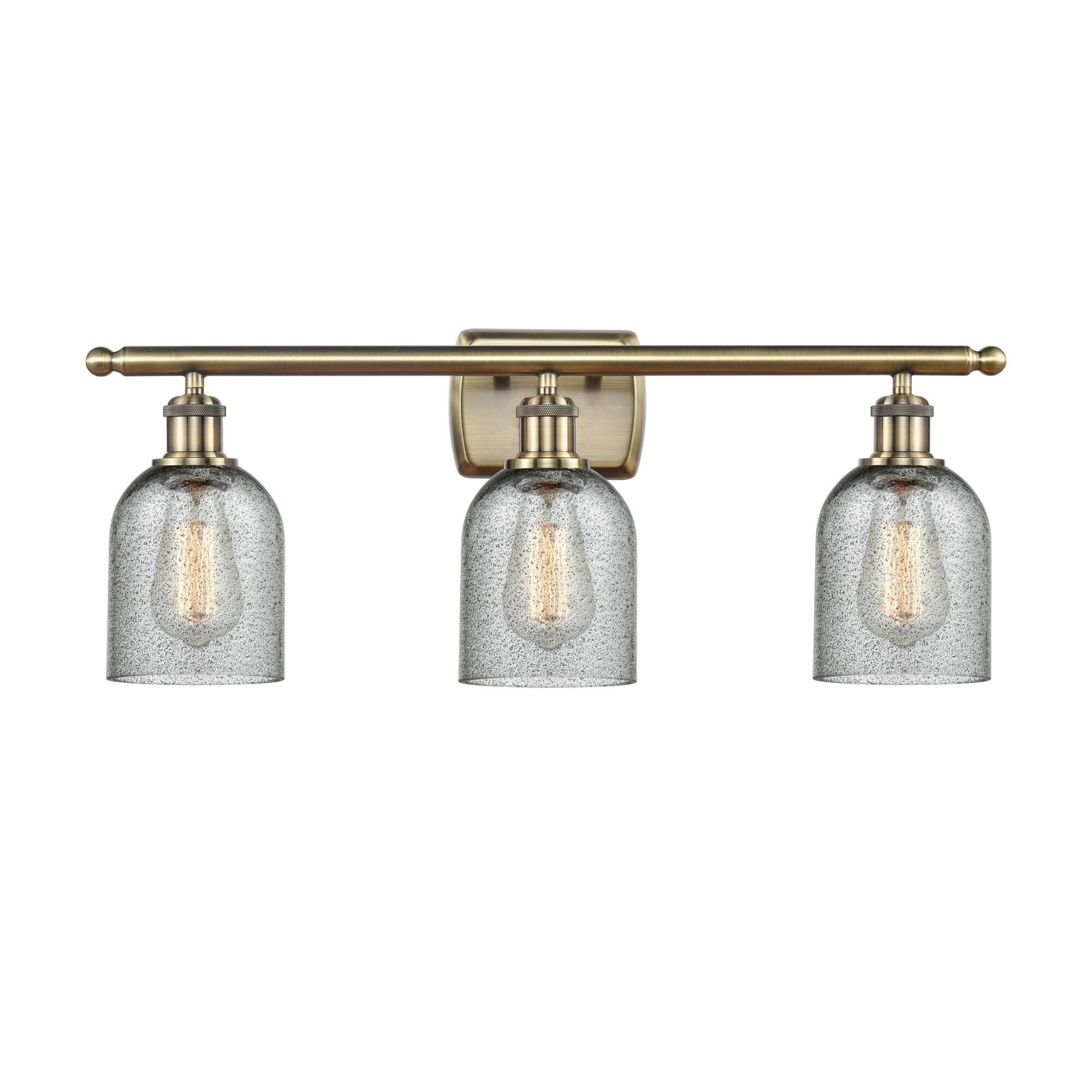 Shown in Antique Brass finish and Bell glass and Glass shade and Polished Chrome accent