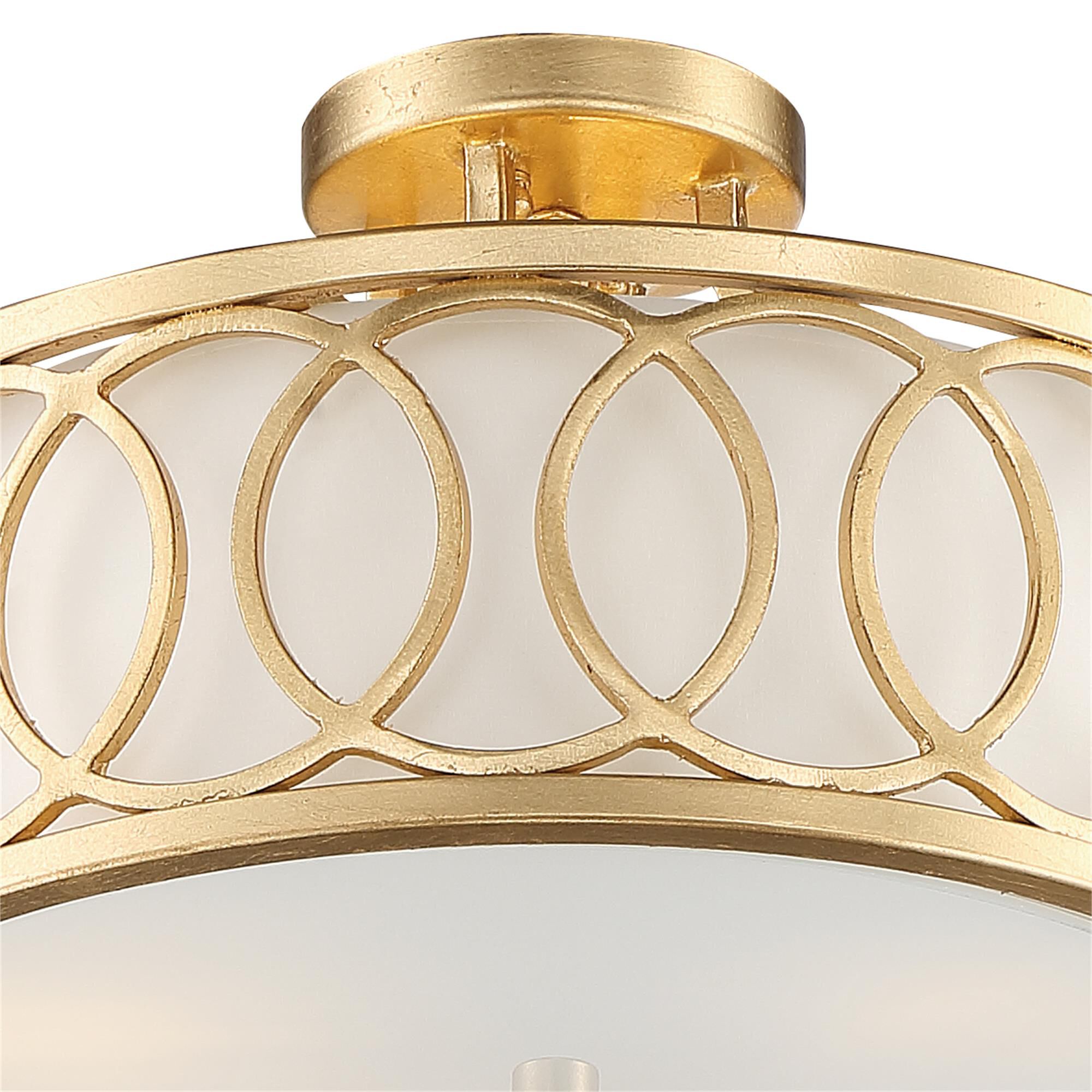 Shown in Antique Gold finish and Silk glass and White shade