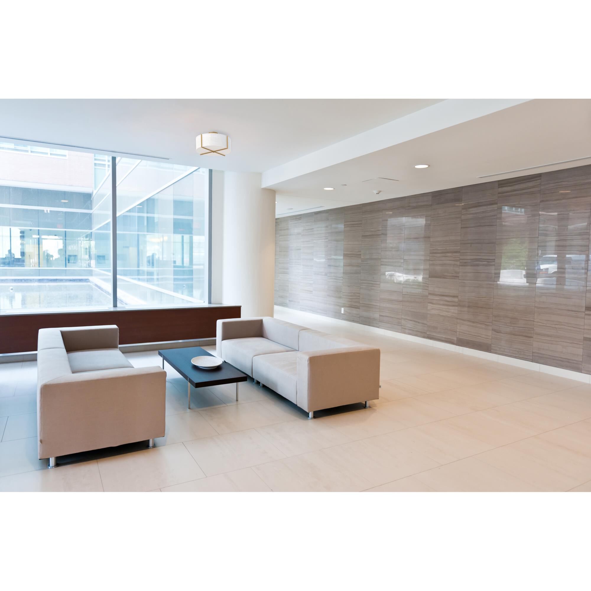 Shown in Heritage Brass finish and Off White Linen shade