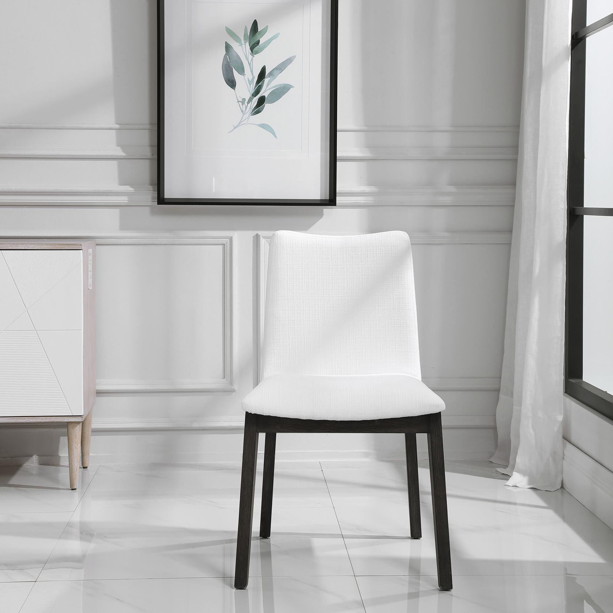 Shown in Gently Sloped Padded Seat In A Crisp White Polyester Blend Fabric Rests Within A Solid Oak Wood Fram finish
