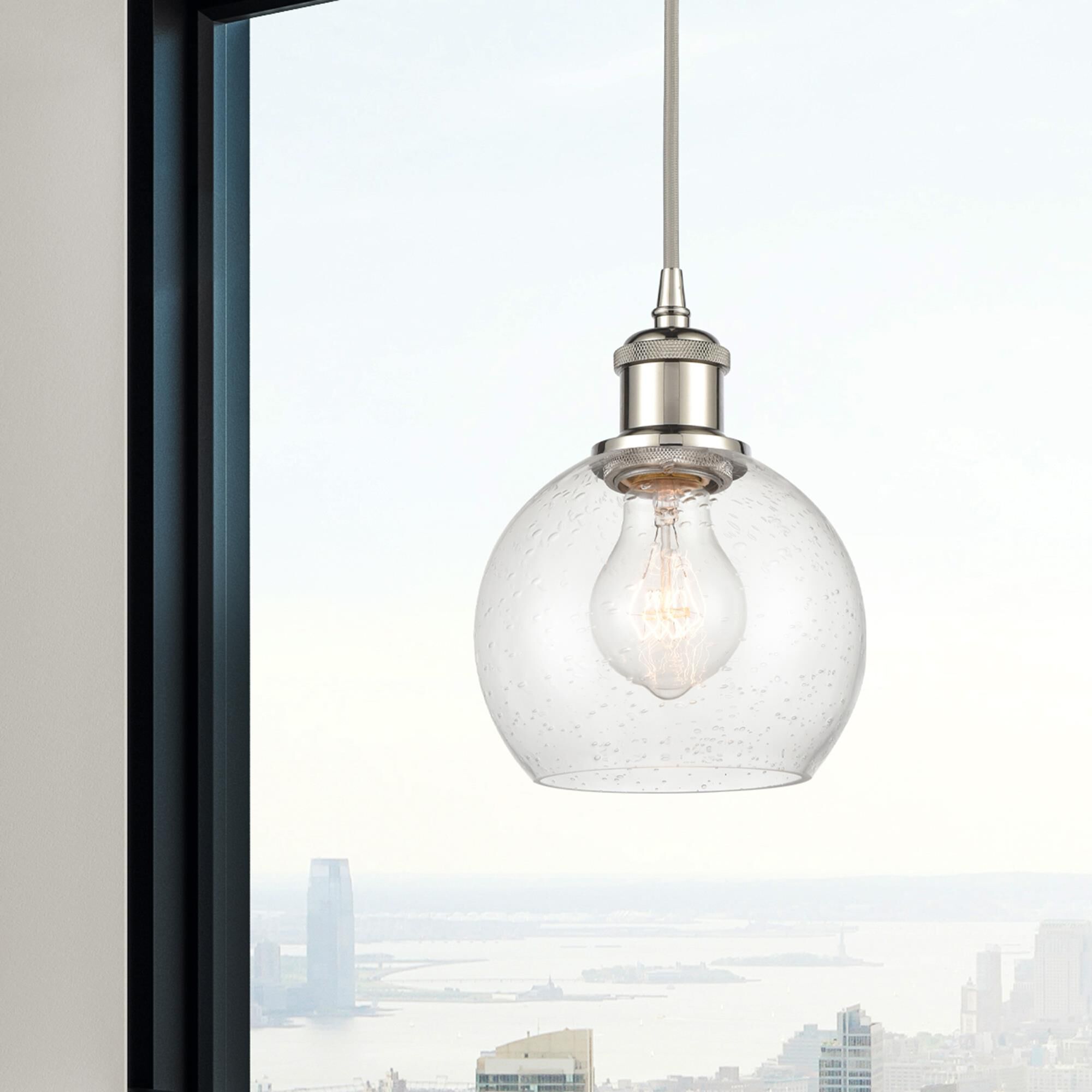 Shown in Polished Nickel finish and Seedy glass