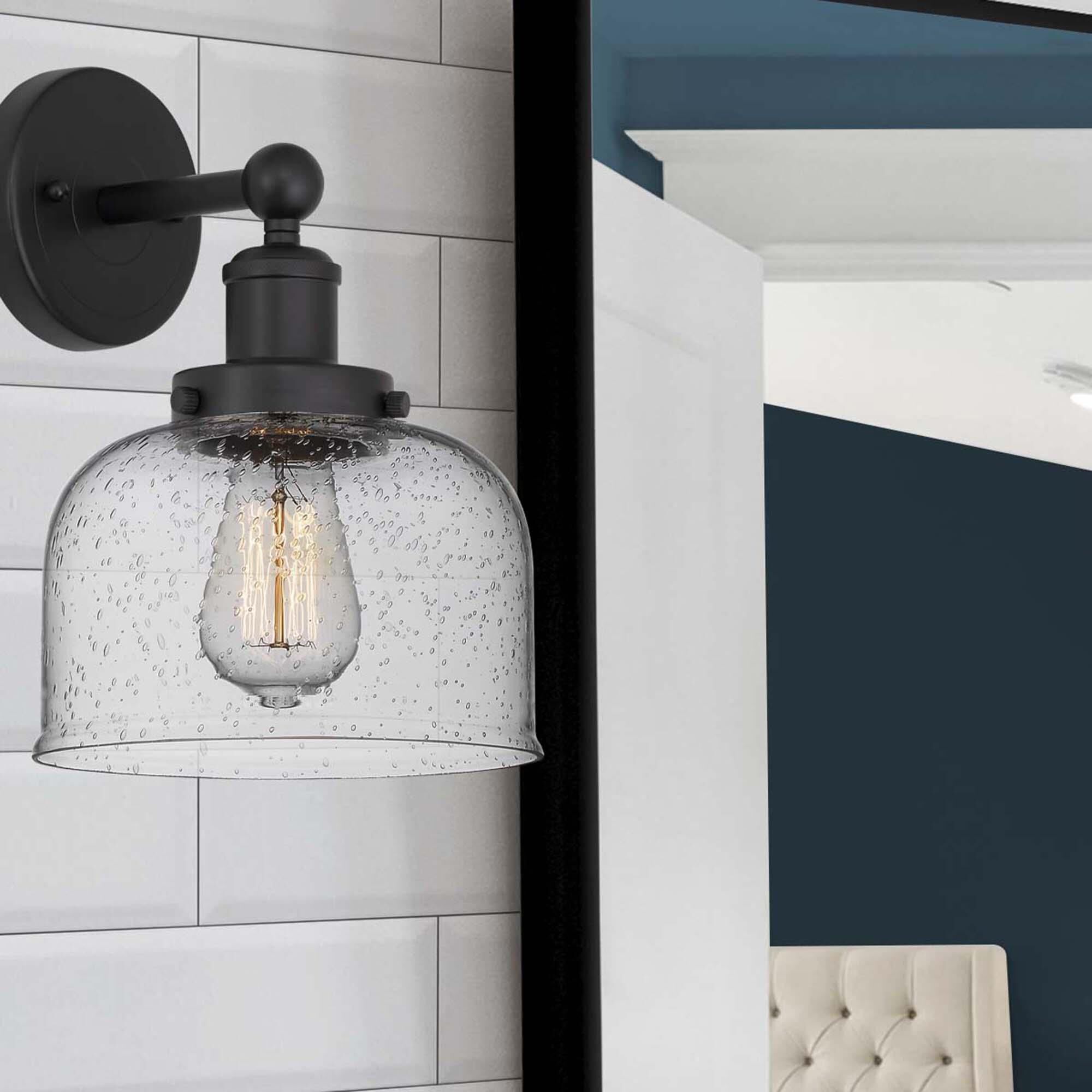 Shown in Matte Black  finish and Clear Seedy glass