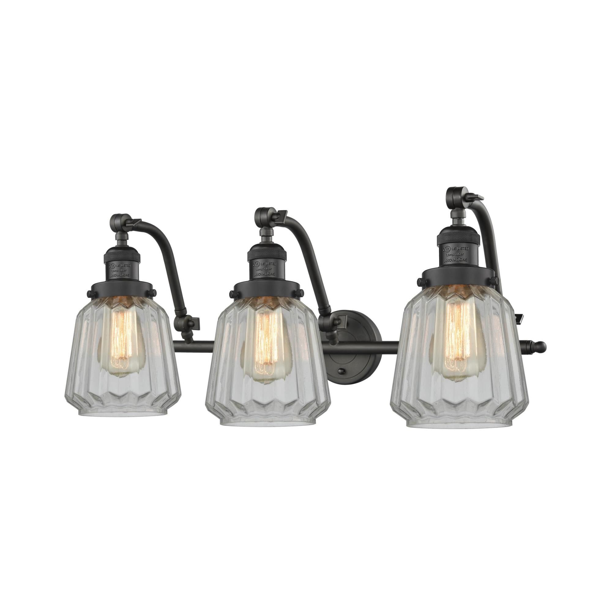 Shown in Oil Rubbed Bronze finish and Clear Fluted glass