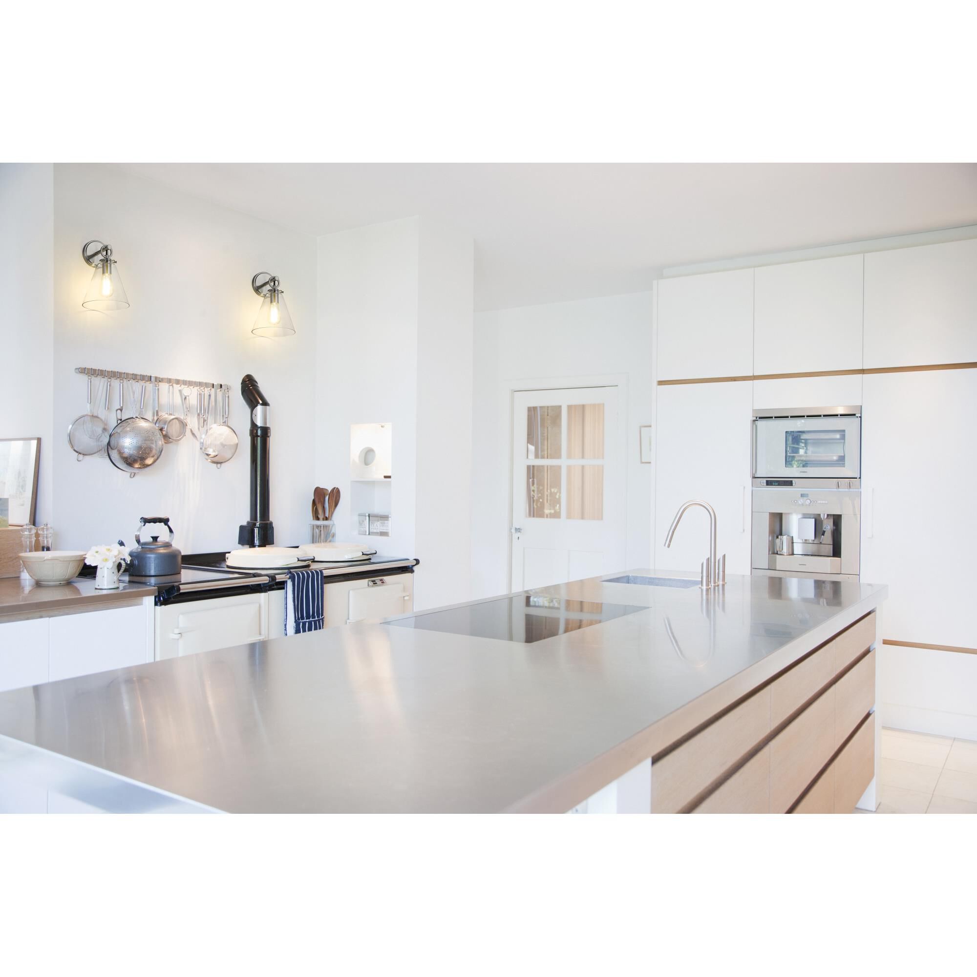 Shown in Brushed Nickel finish and Glass shade