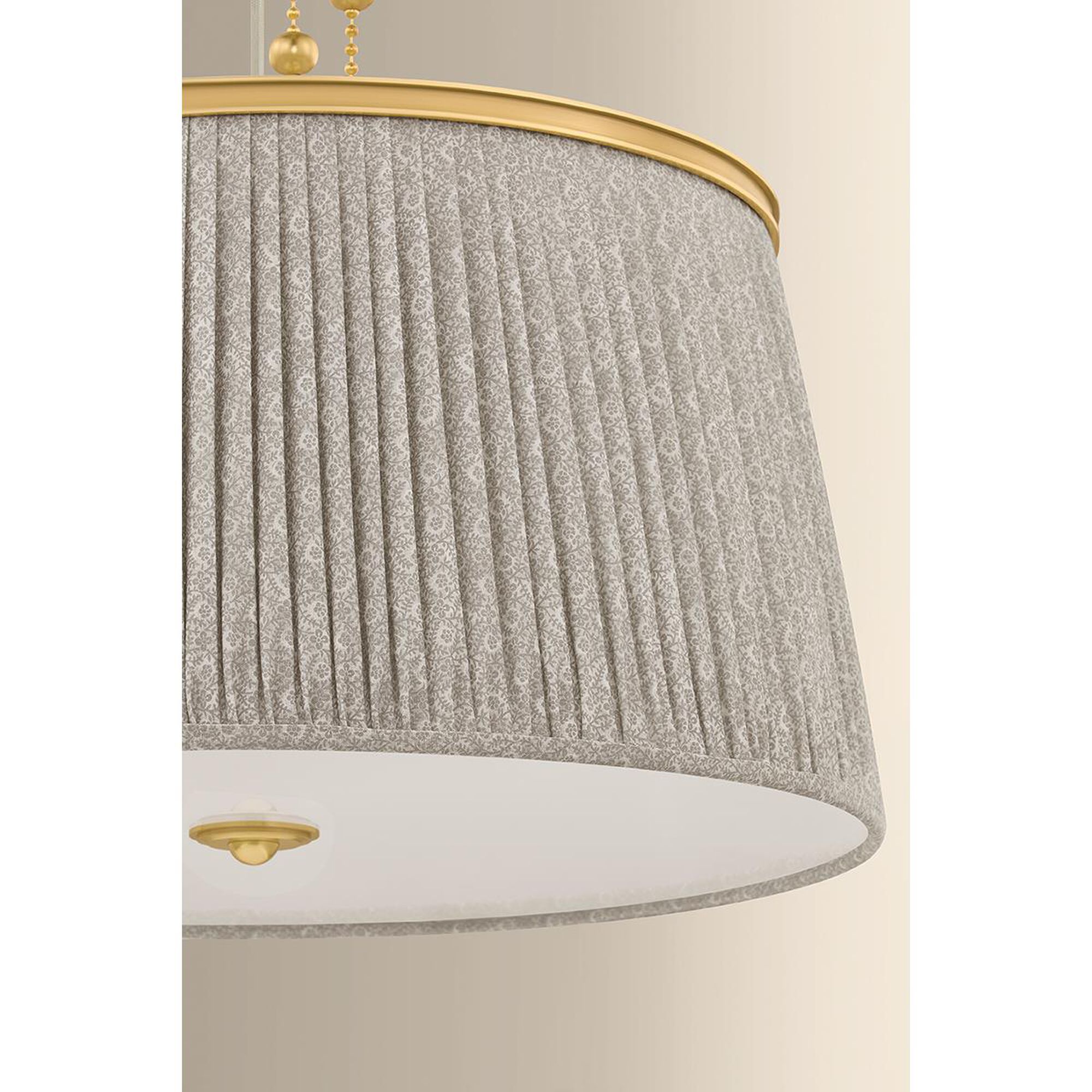 Shown in Aged Brass finish and Gathered Printed Cotton shade