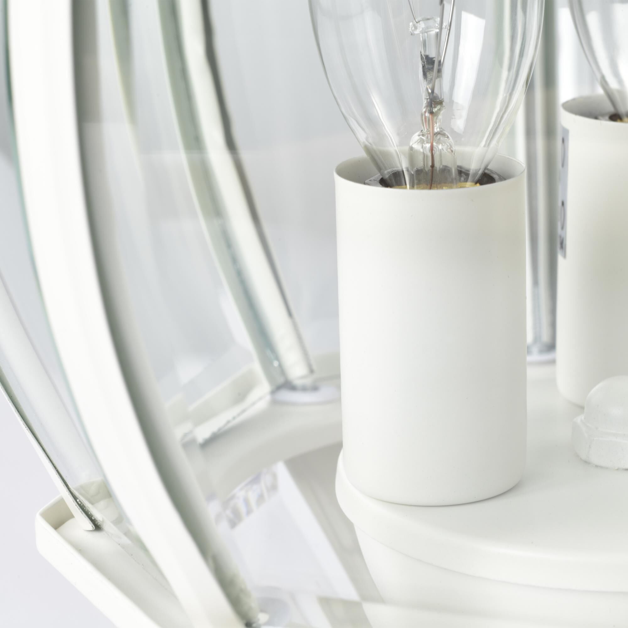 Shown in White finish and Clear Beveled Panels glass