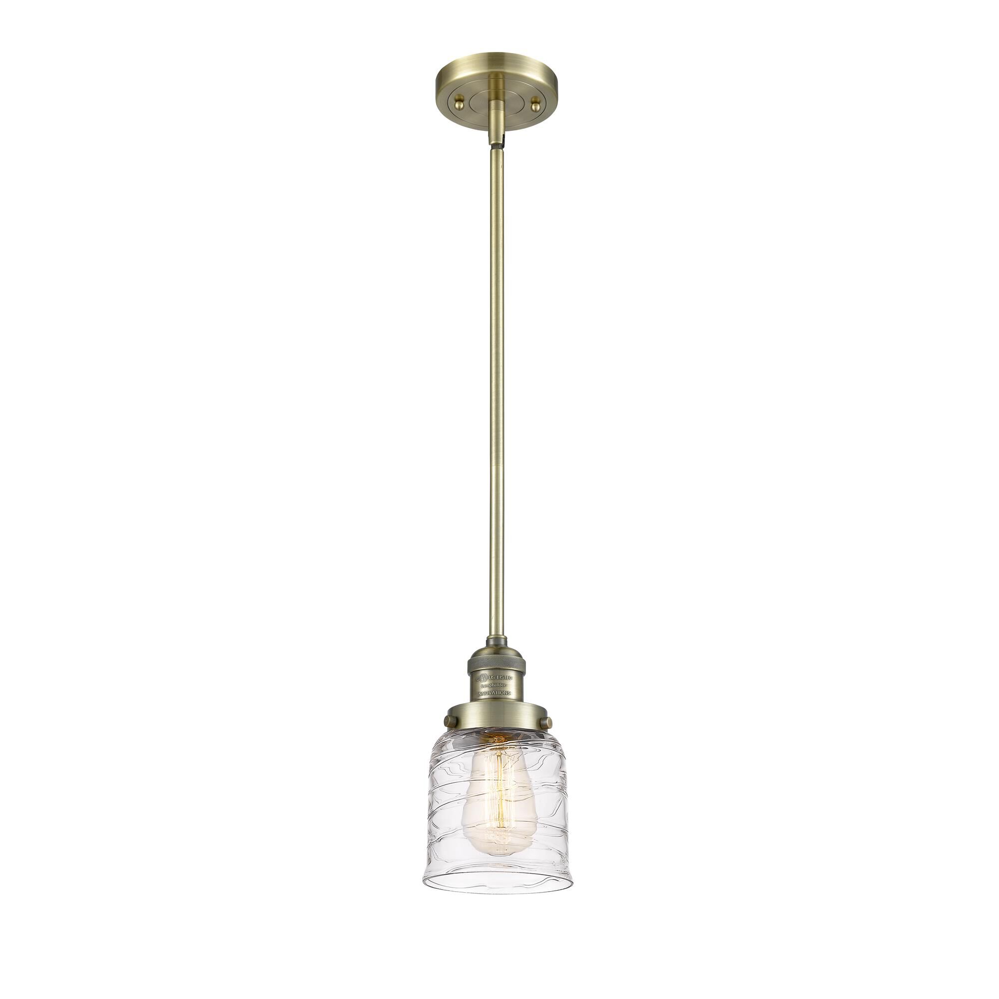 Shown in Antique Brass finish and Clear Deco Swirl Small Bell glass