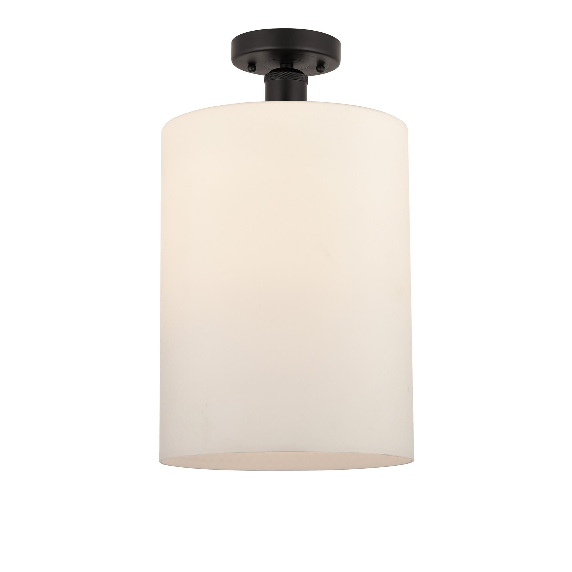 Shown in Oil Rubbed Bronze finish and Matte White glass