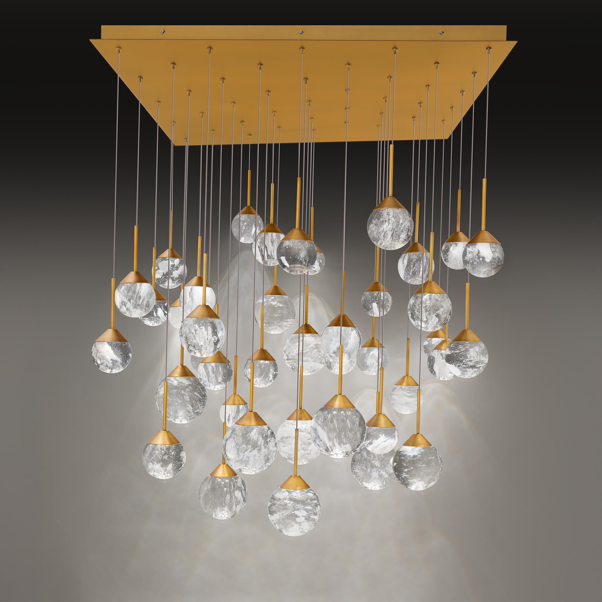 Shown in Aged Brass finish and Optic Haze Quartz Crystal crystal