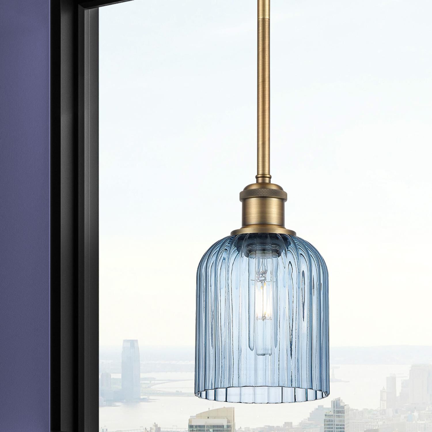 Shown in Brushed Brass finish and Princess Blue glass