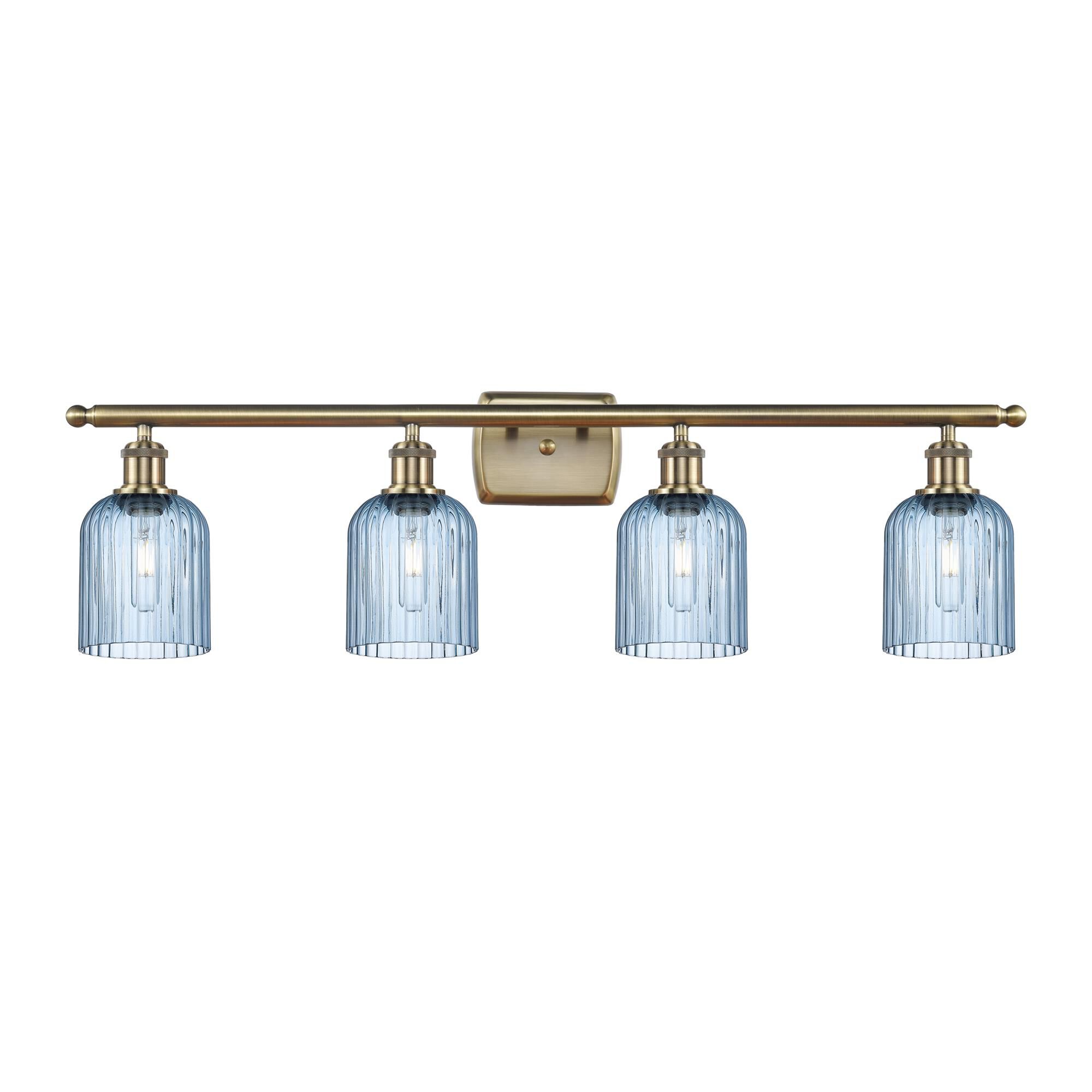 Shown in Antique Brass finish and Princess Blue shade