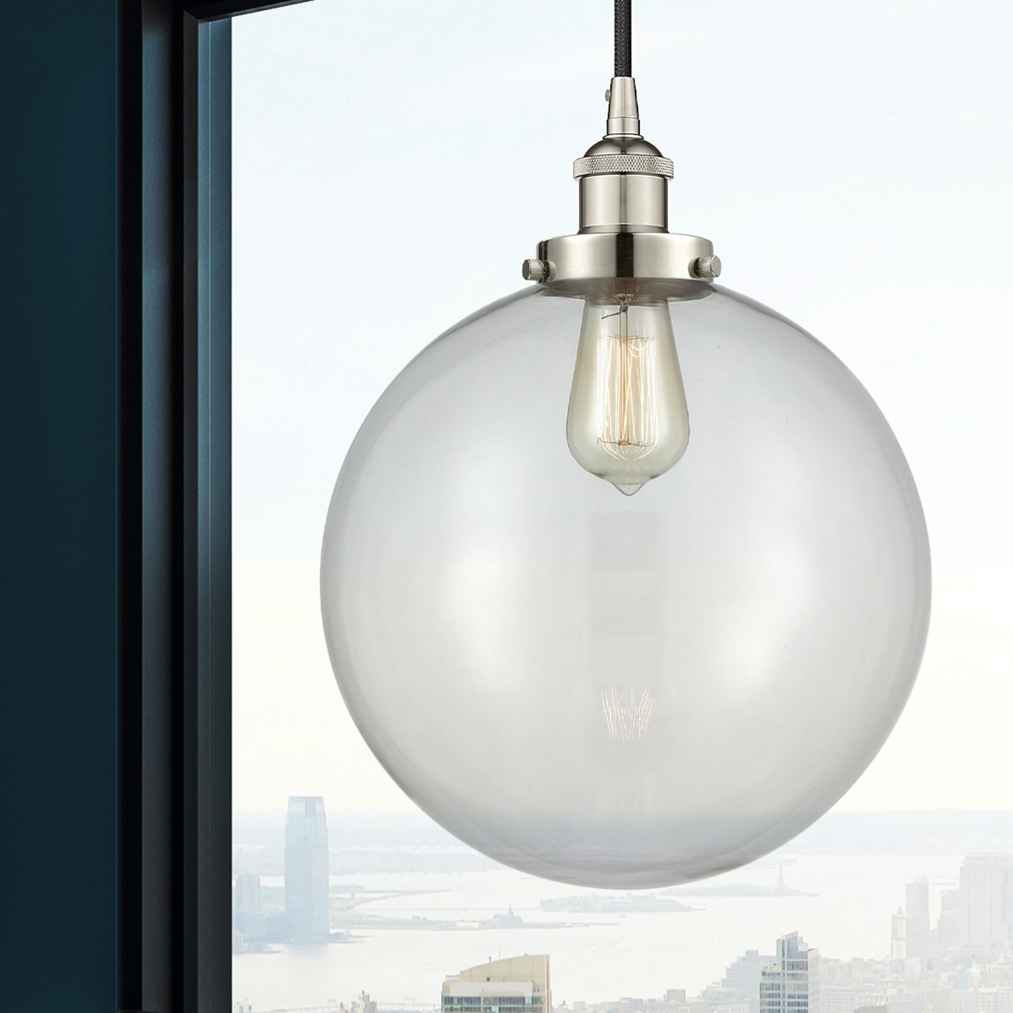 Shown in Polished Nickel finish and Clear Beacon glass