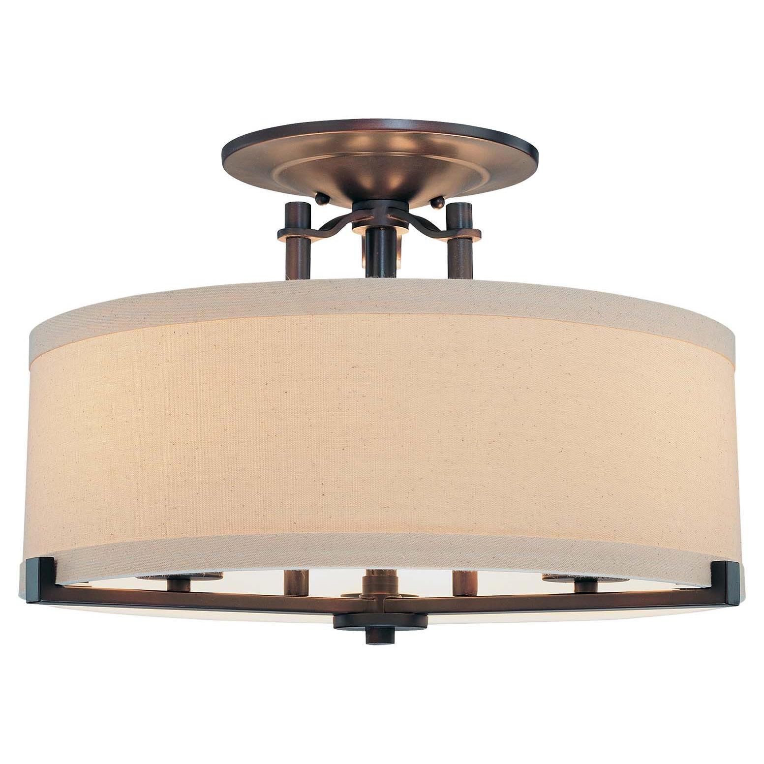 Shown in Aged Kinston Bronze finish and Beige Linen glass and Fabric shade