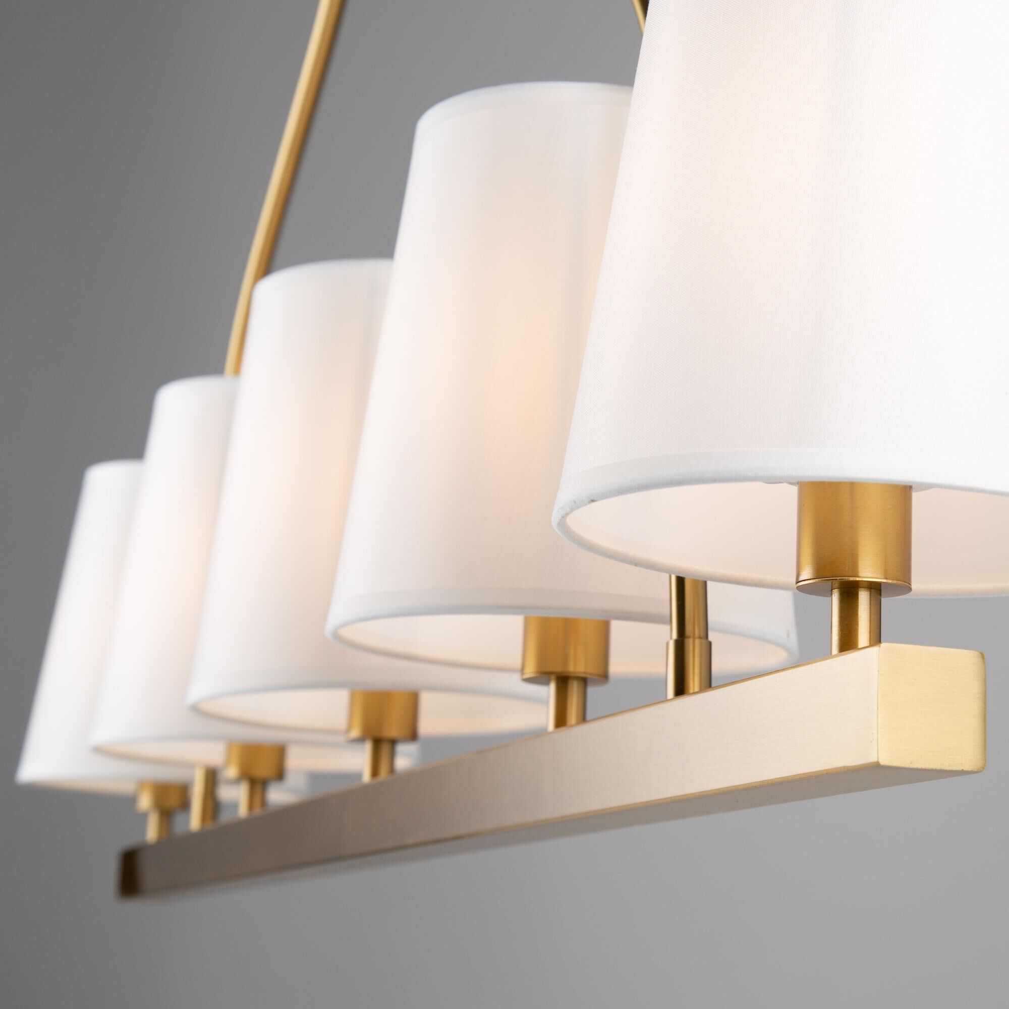 Shown in Brushed Gold finish and White Linen shade