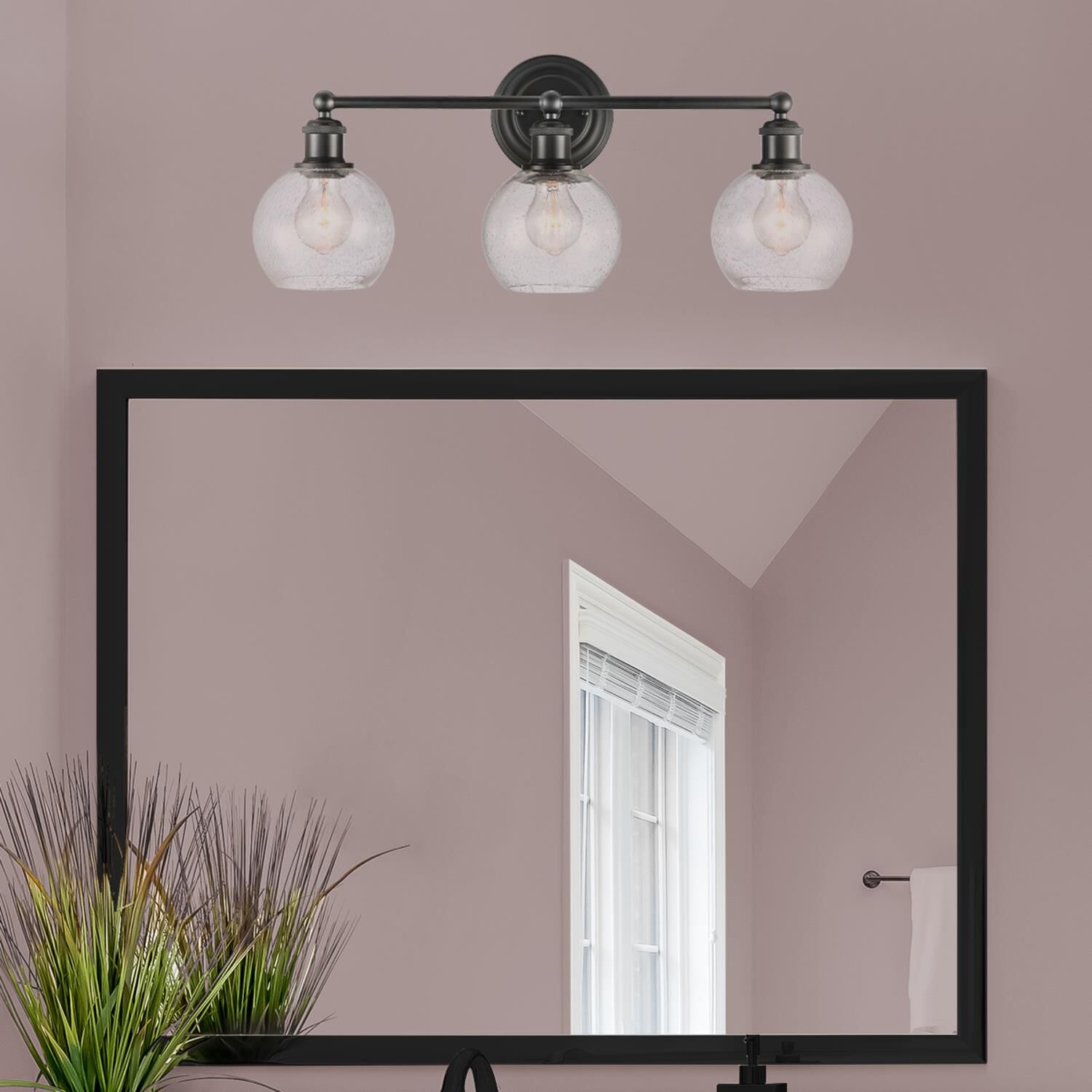 Shown in Matte Black  finish and Seedy glass