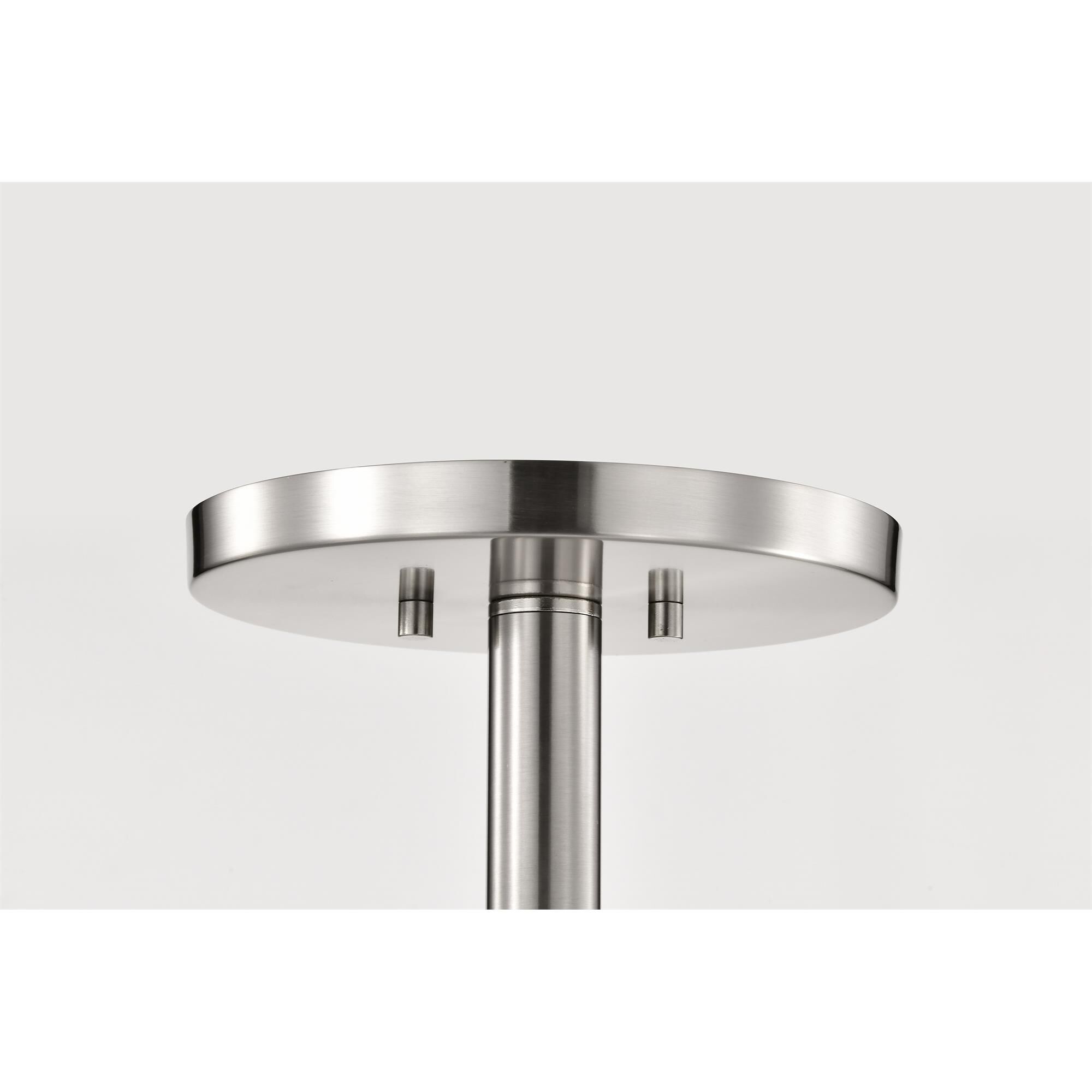 Shown in Brushed Nickel finish and Etched White glass