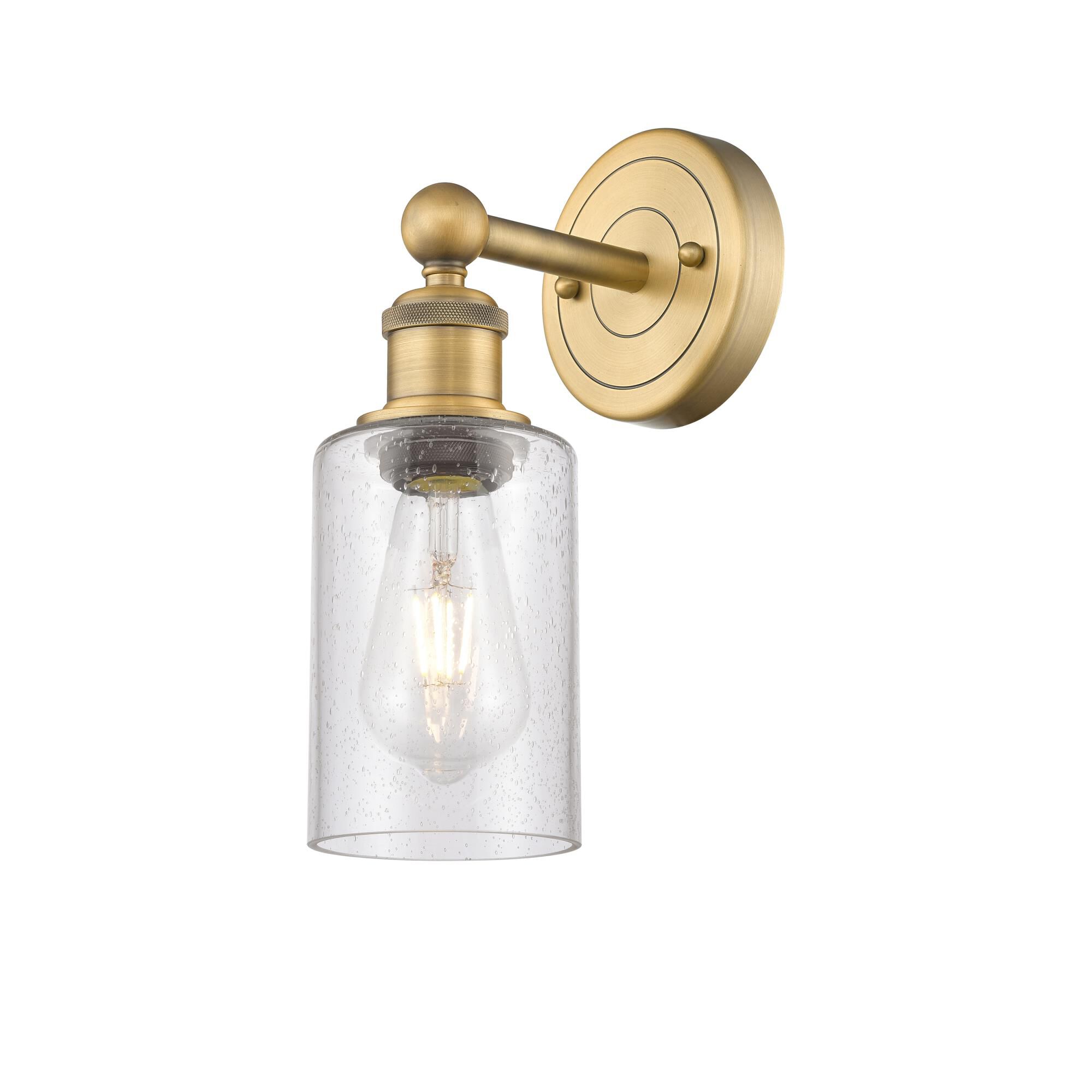 Shown in Brushed Brass finish and Seedy glass
