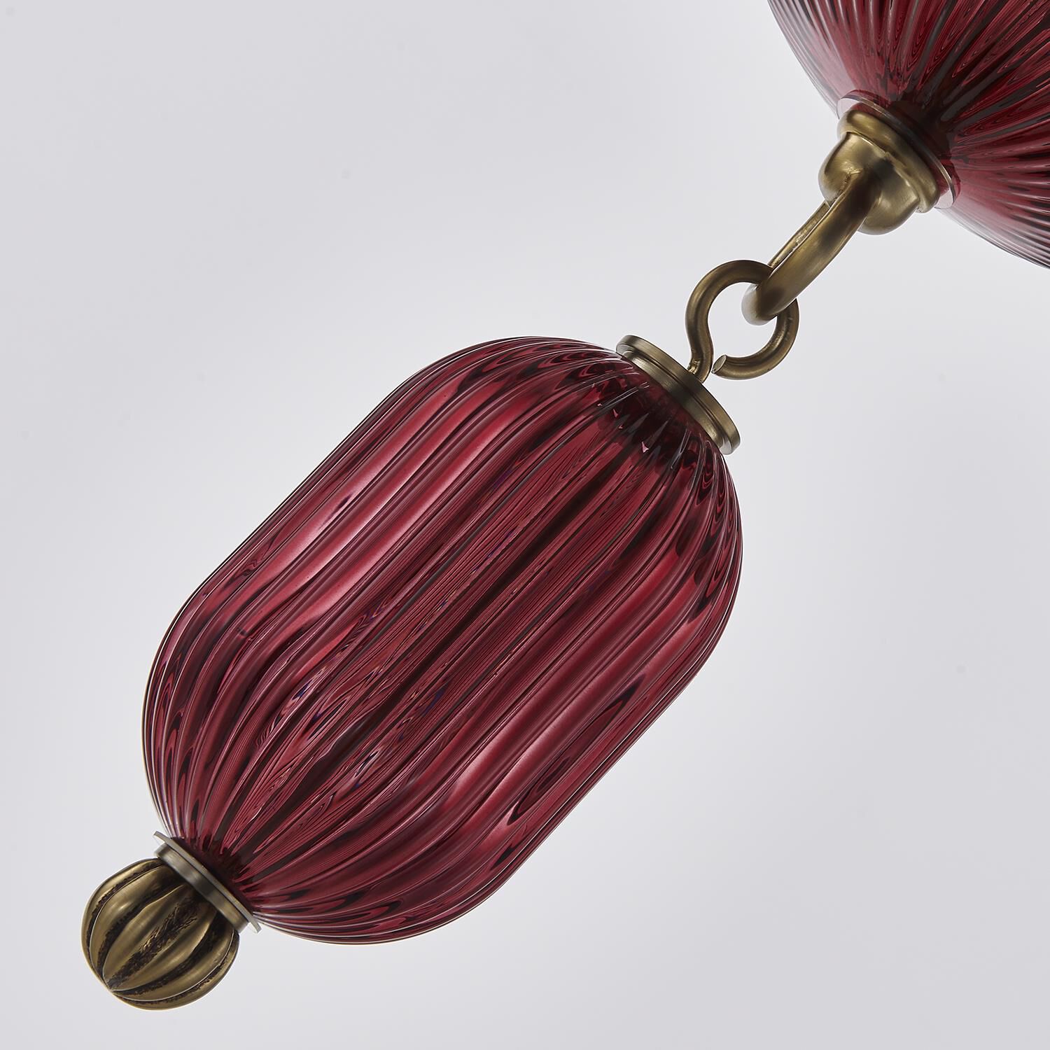 Shown in Satin Brass finish and Peacock Green glass