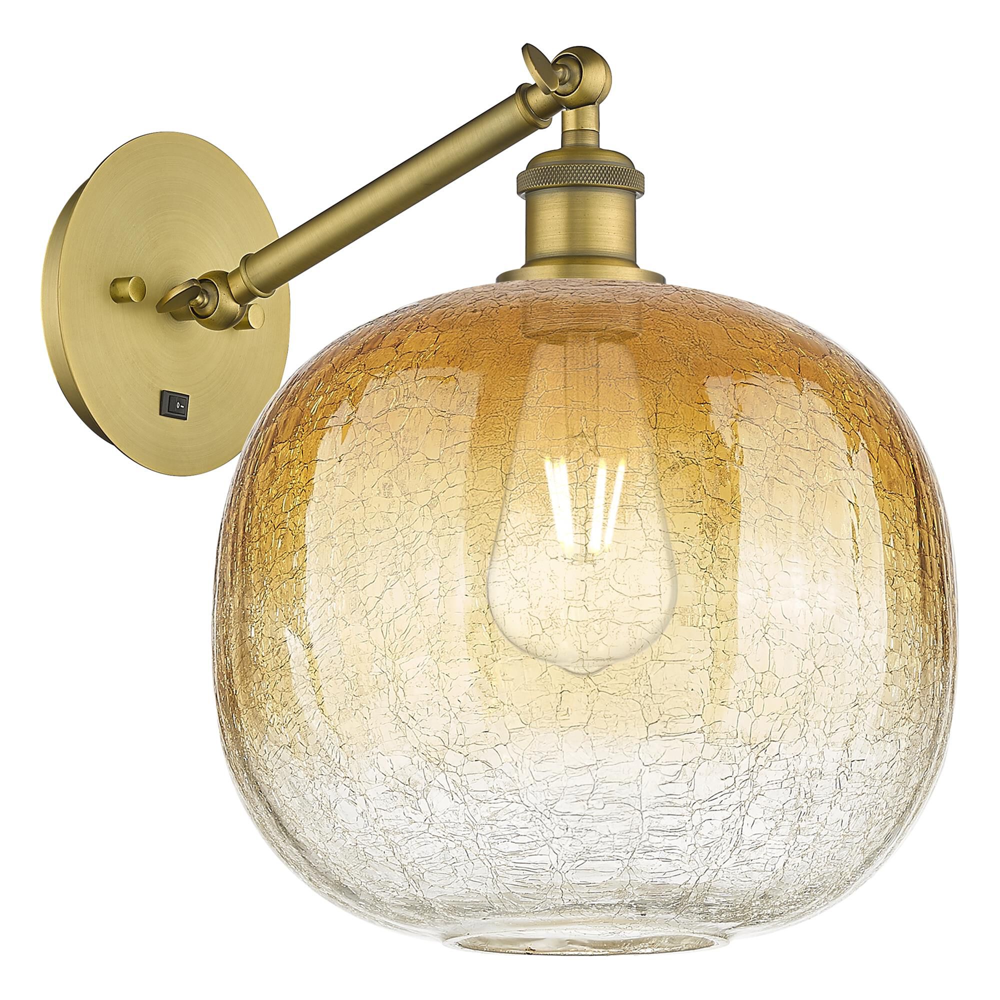 Shown in Brushed Brass finish and Amber glass