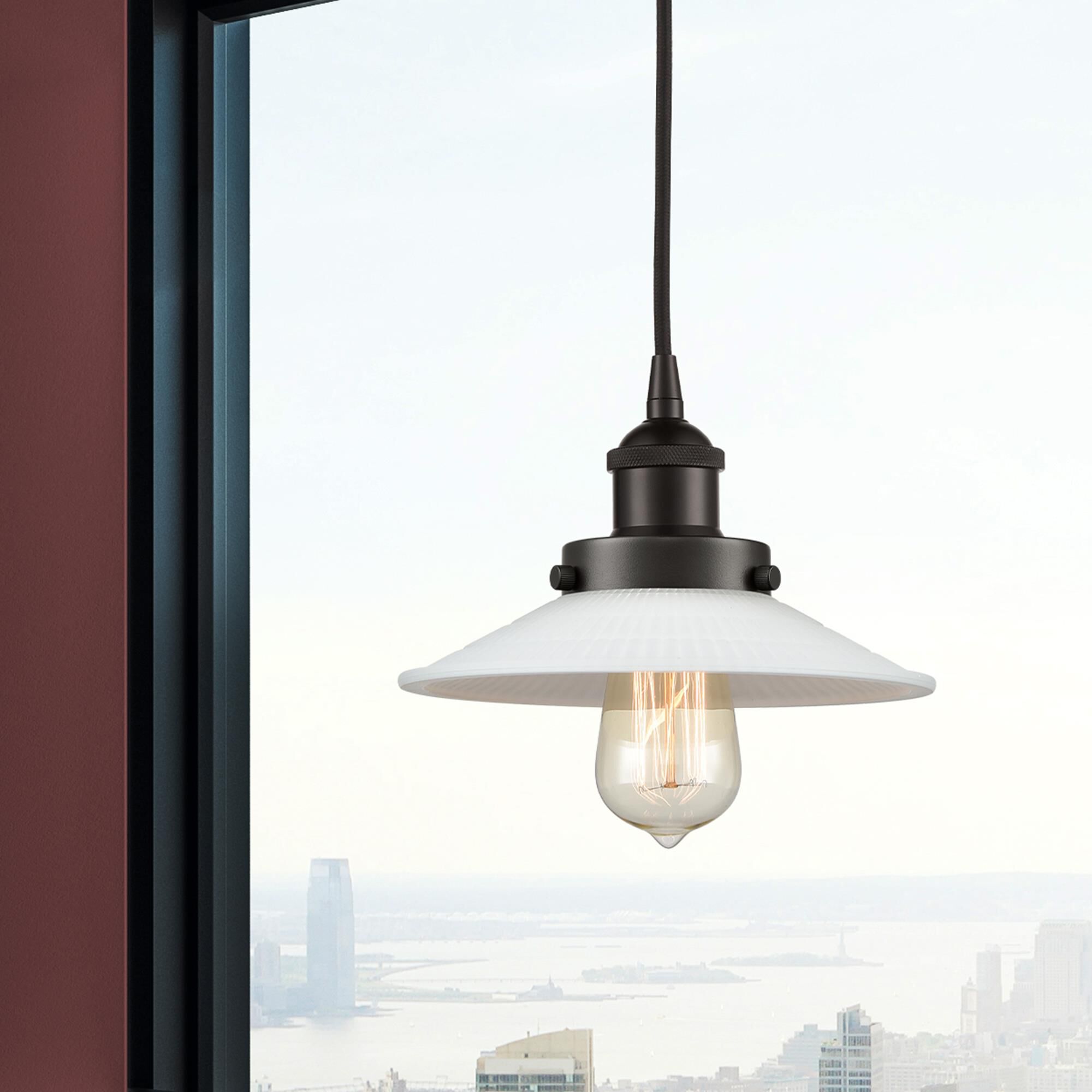 Shown in Oil Rubbed Bronze finish and White glass