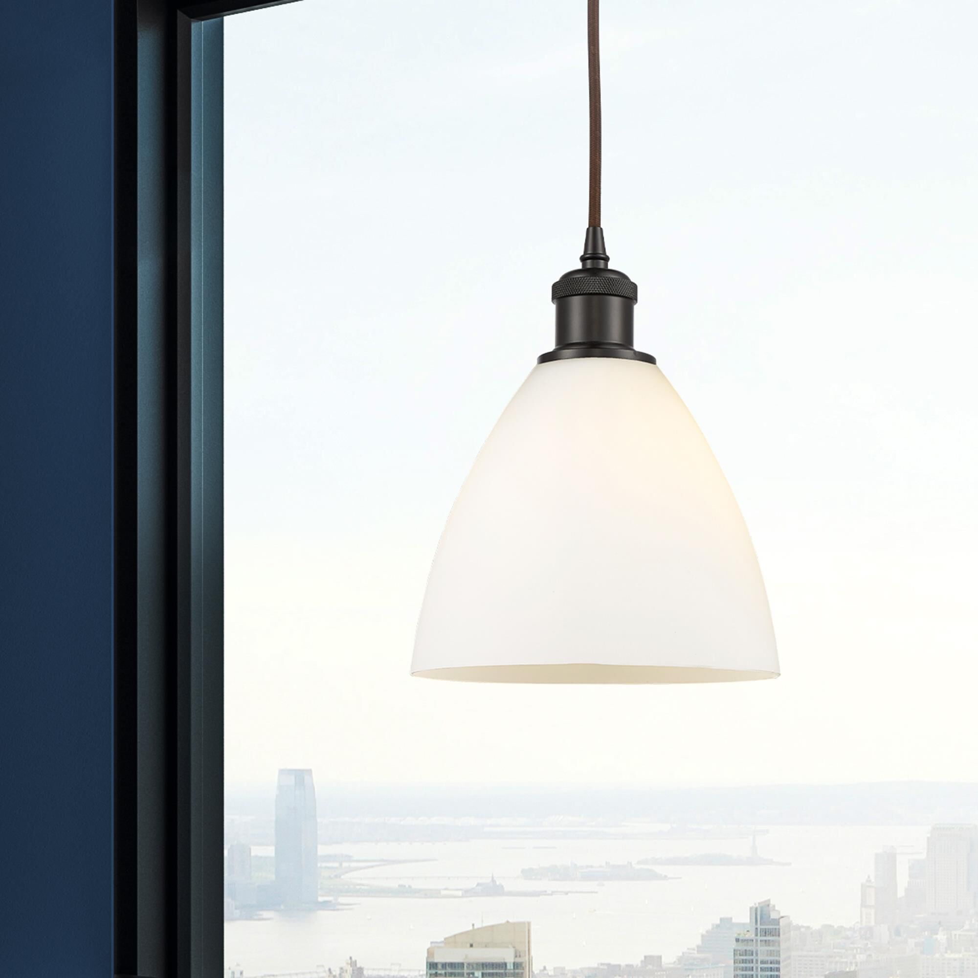 Shown in Oil Rubbed Bronze finish and Matte White glass