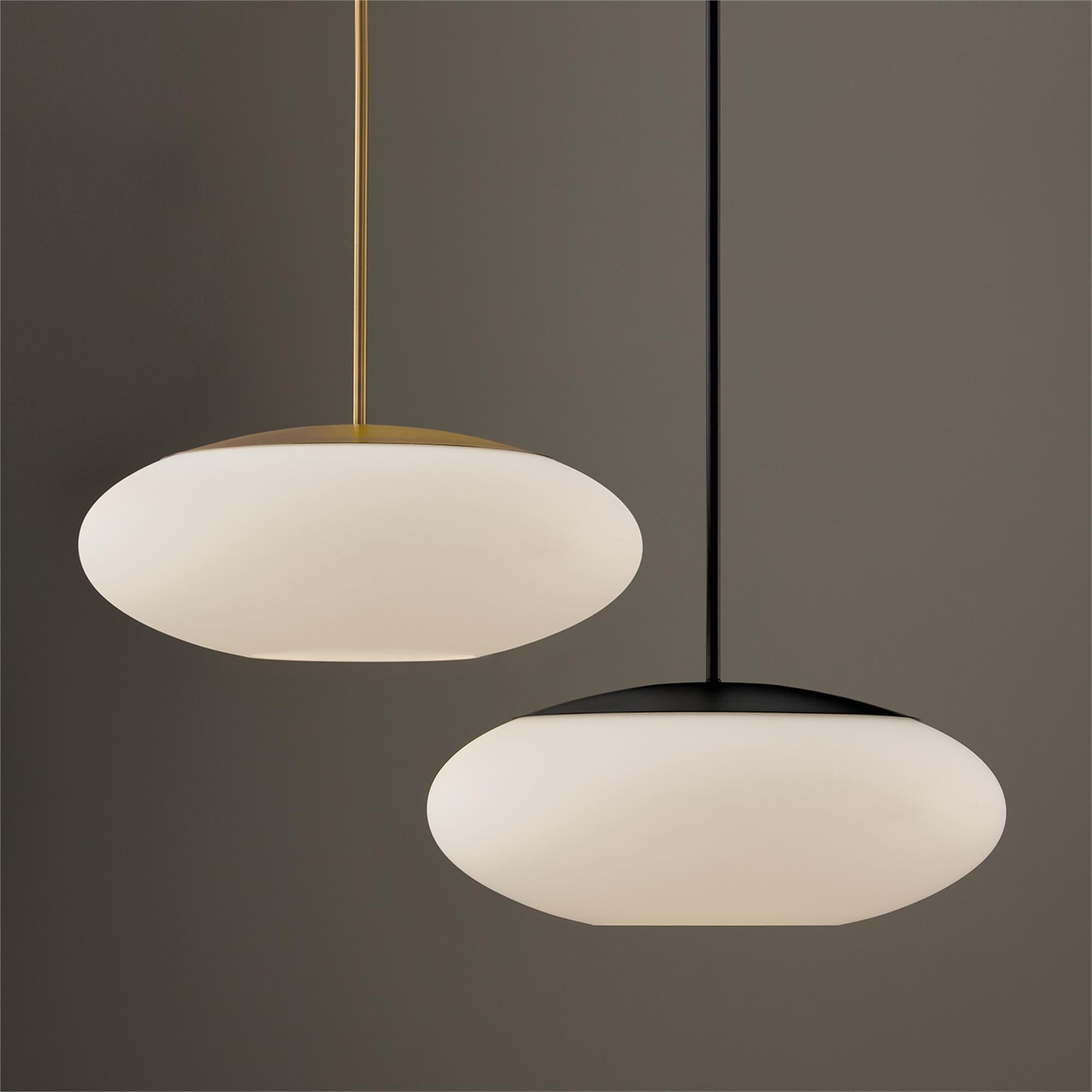 Shown in Aged Brass finish and Soft White glass