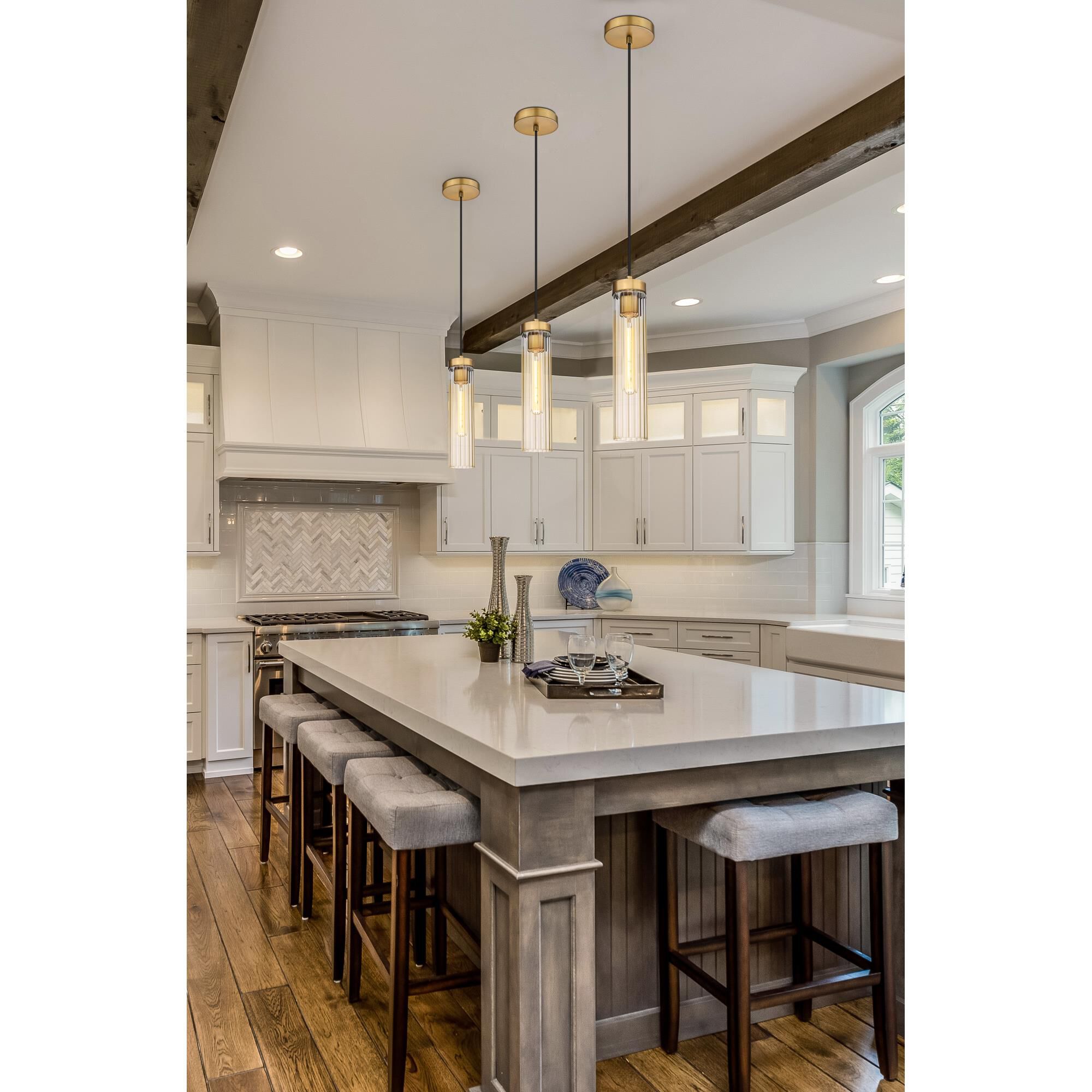 Shown in Rubbed Brass finish and Clear glass