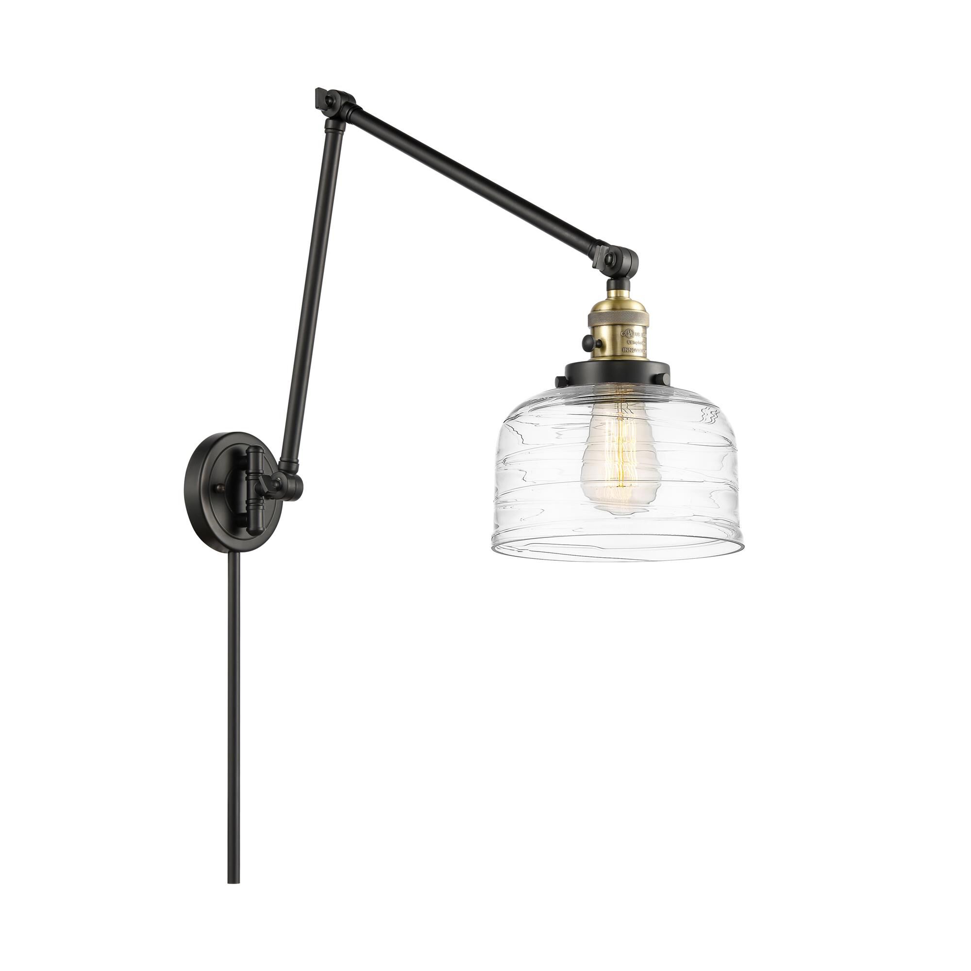 Shown in Black Antique Brass finish and Clear Deco Swirl Large Bell glass