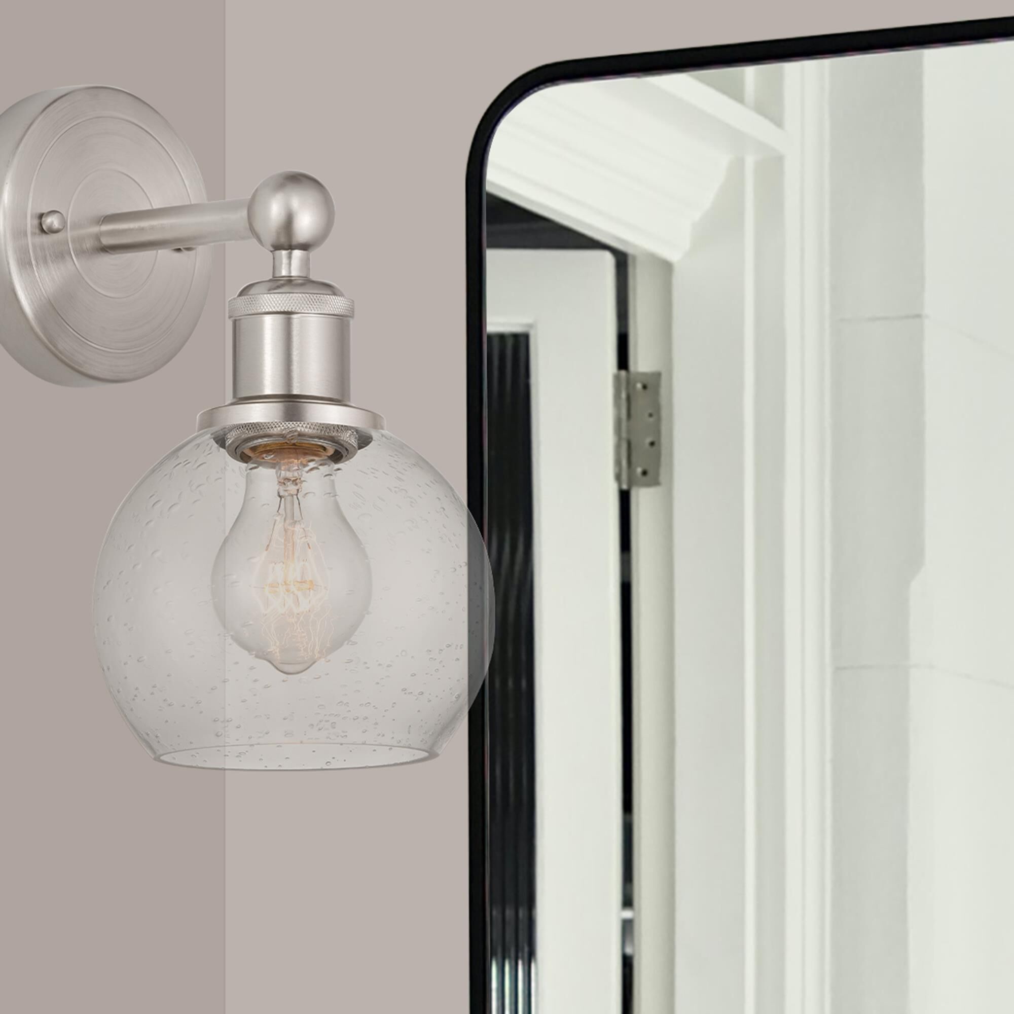 Shown in Brushed Satin Nickel  finish and Seedy glass