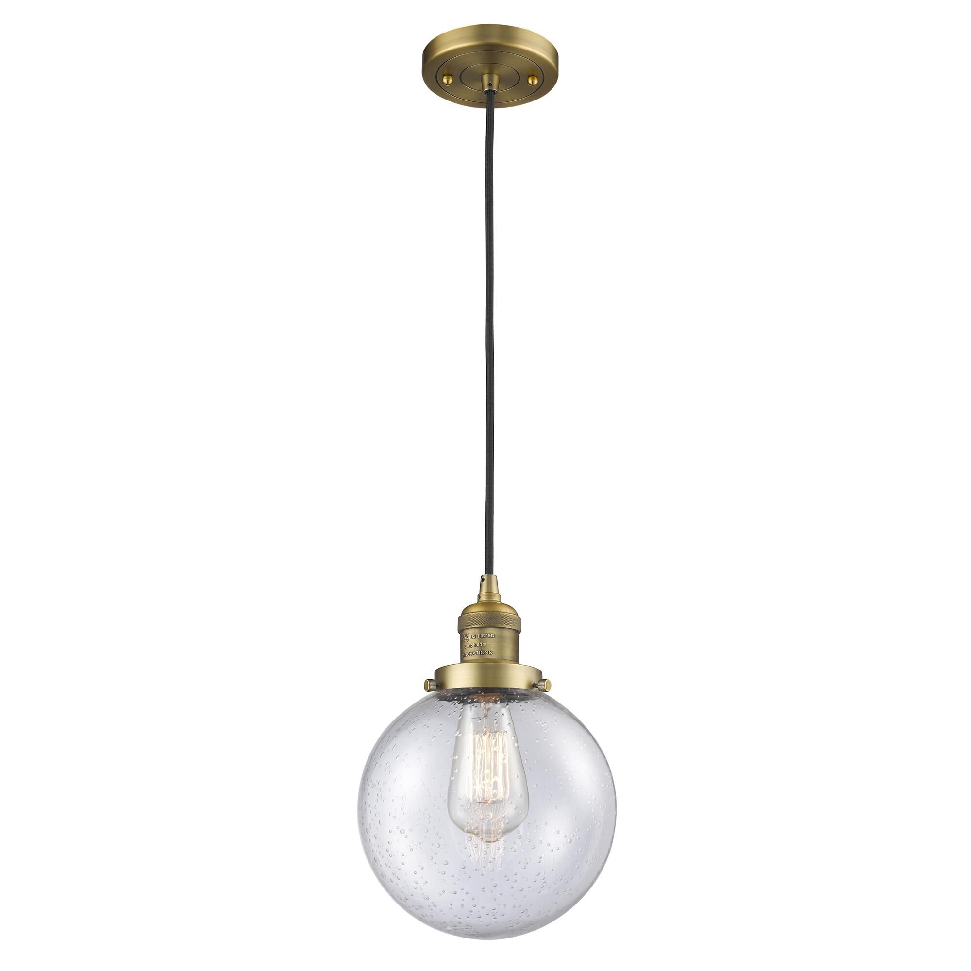 Shown in Brushed Brass finish and Seedy glass