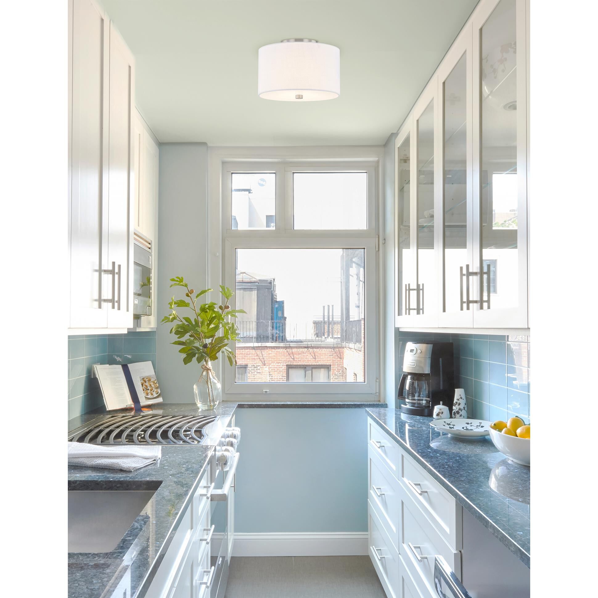 Shown in Brushed Nickel finish and White Woven Fabric shade