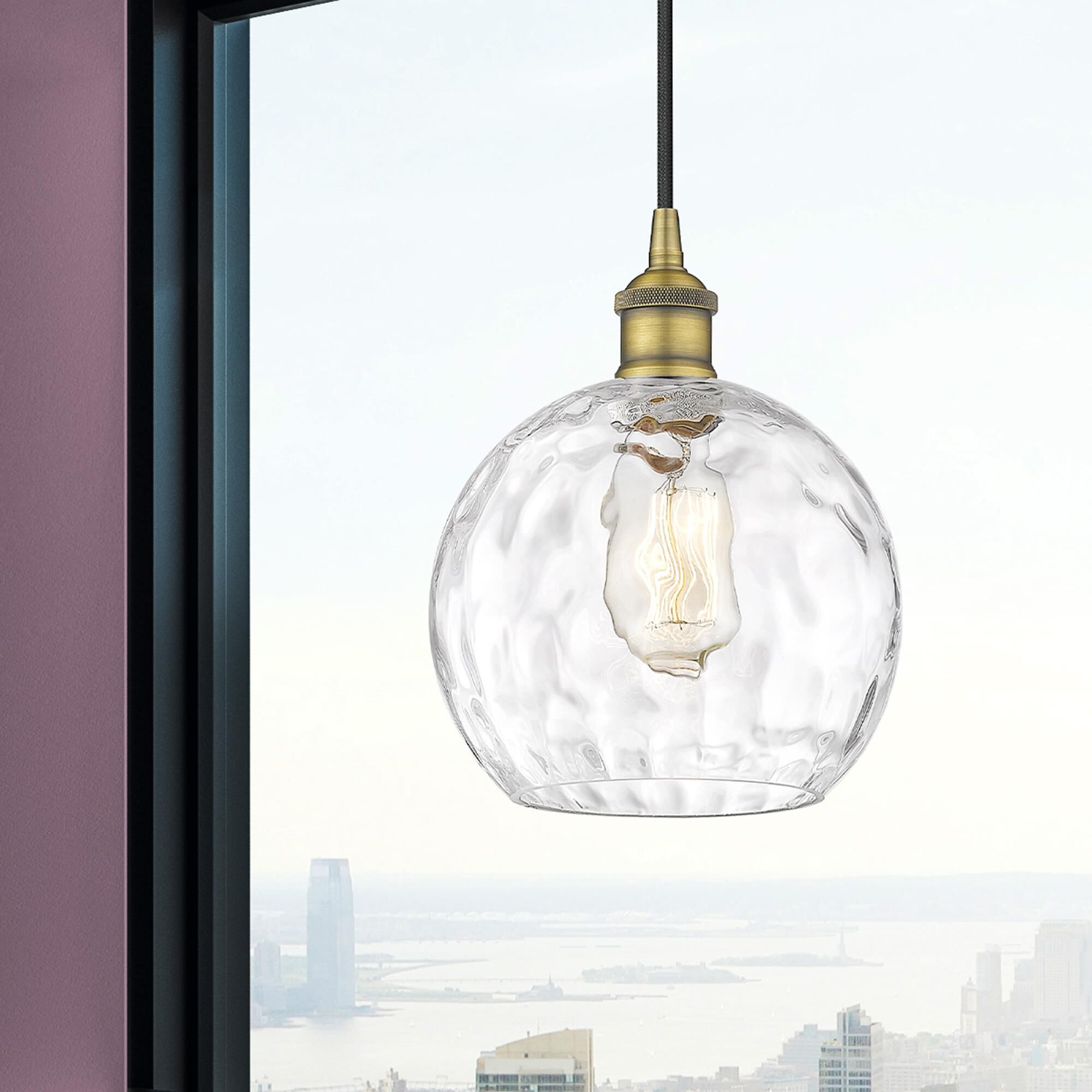 Shown in Brushed Brass finish and Clear glass