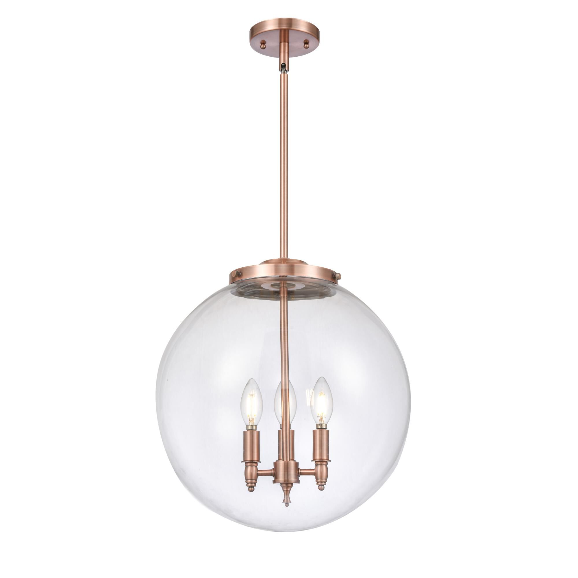 Shown in Antique Copper finish and Clear Beacon glass