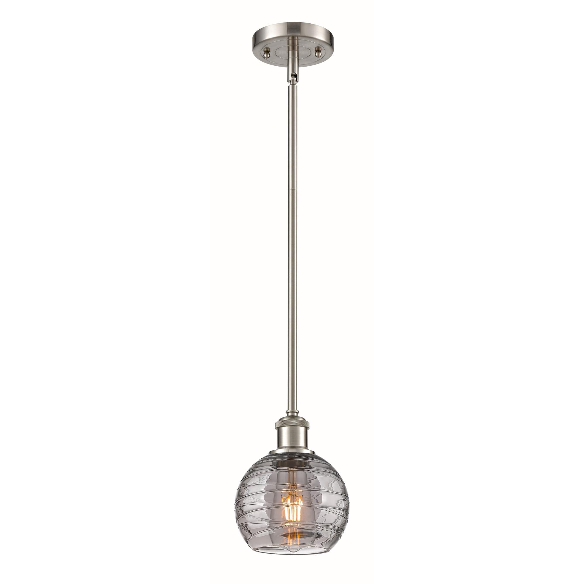 Shown in Brushed Satin Nickel finish and Light Smoke Deco Swirl glass
