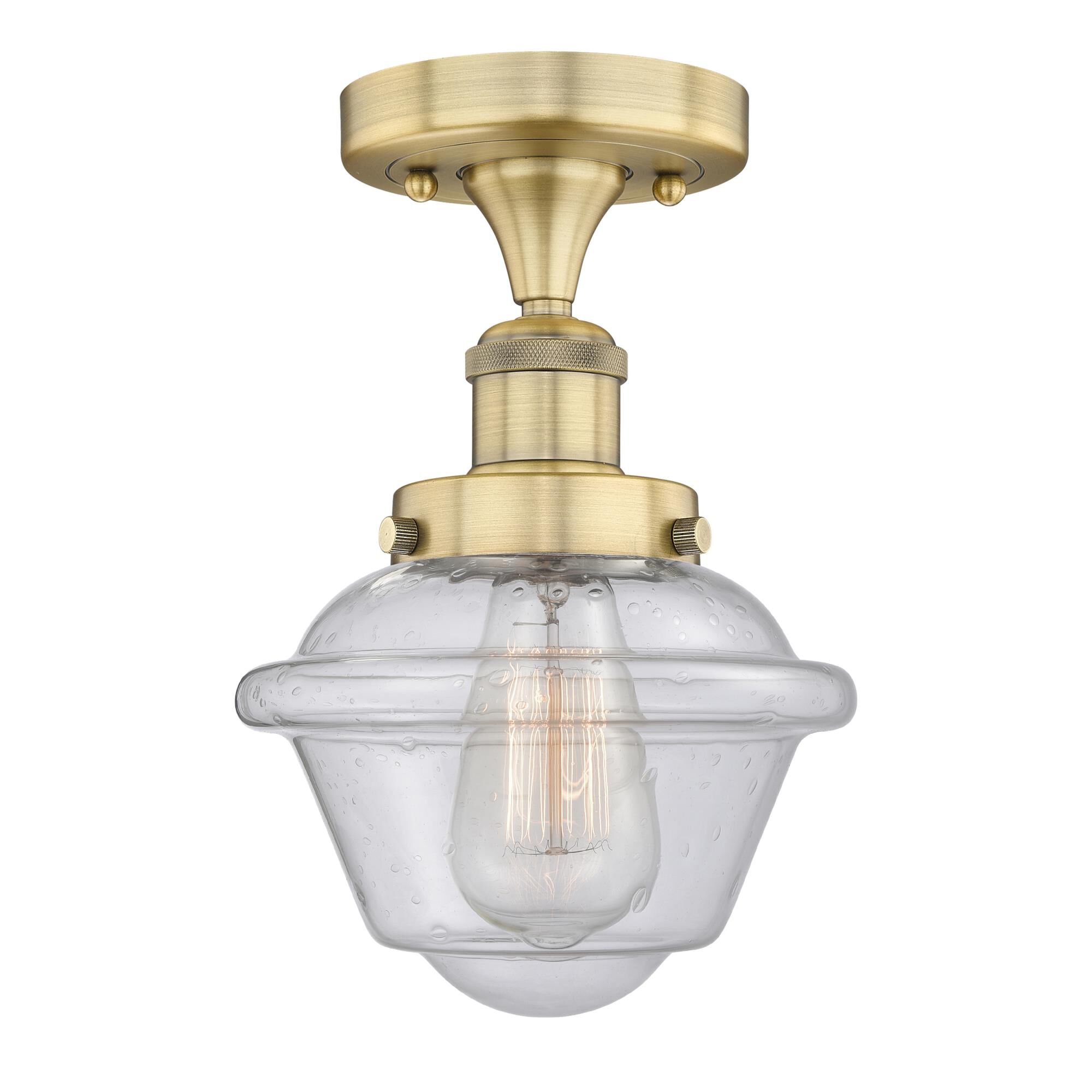 Shown in Brushed Brass finish and Seedy glass