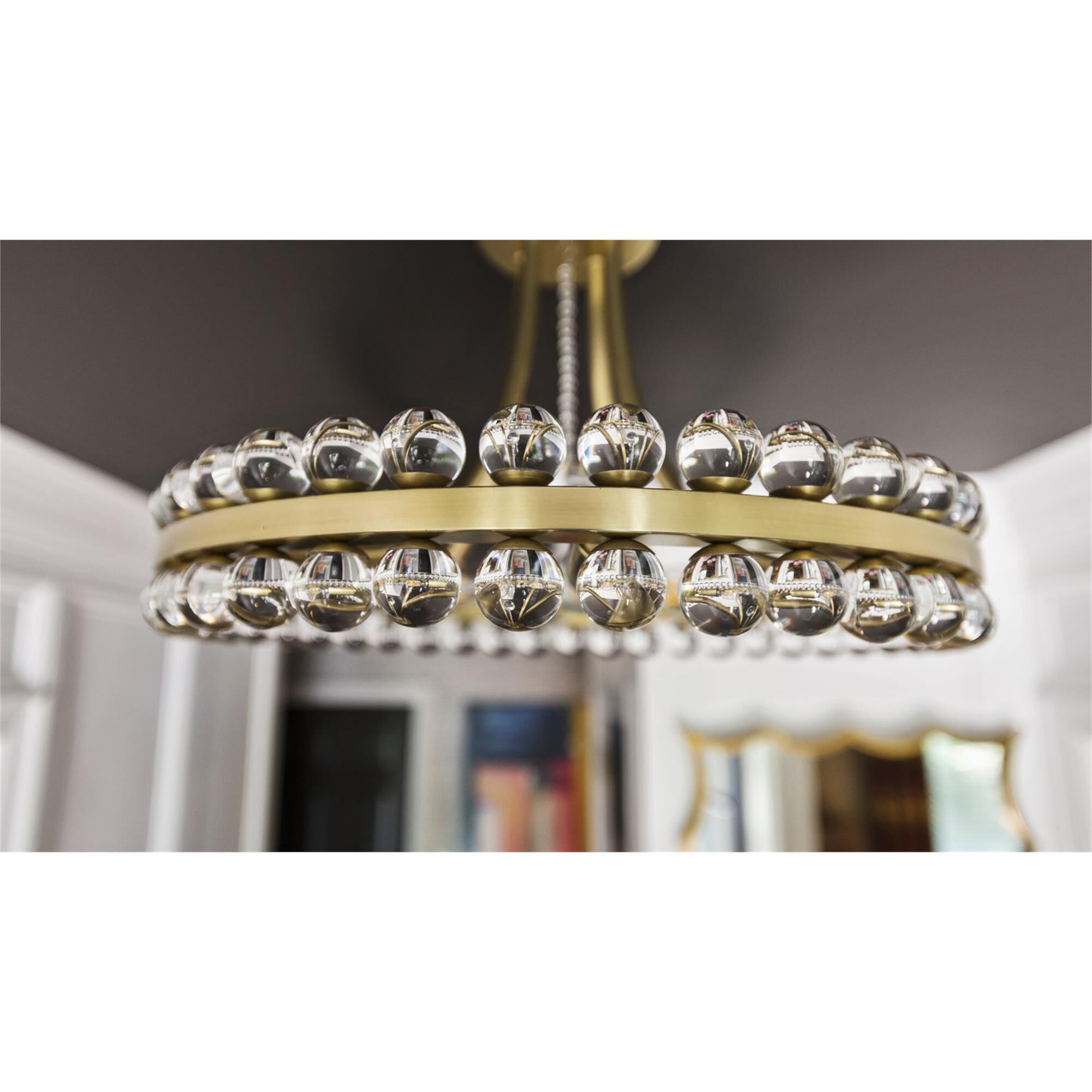 Shown in Aged Brass finish and Glass Ball crystal