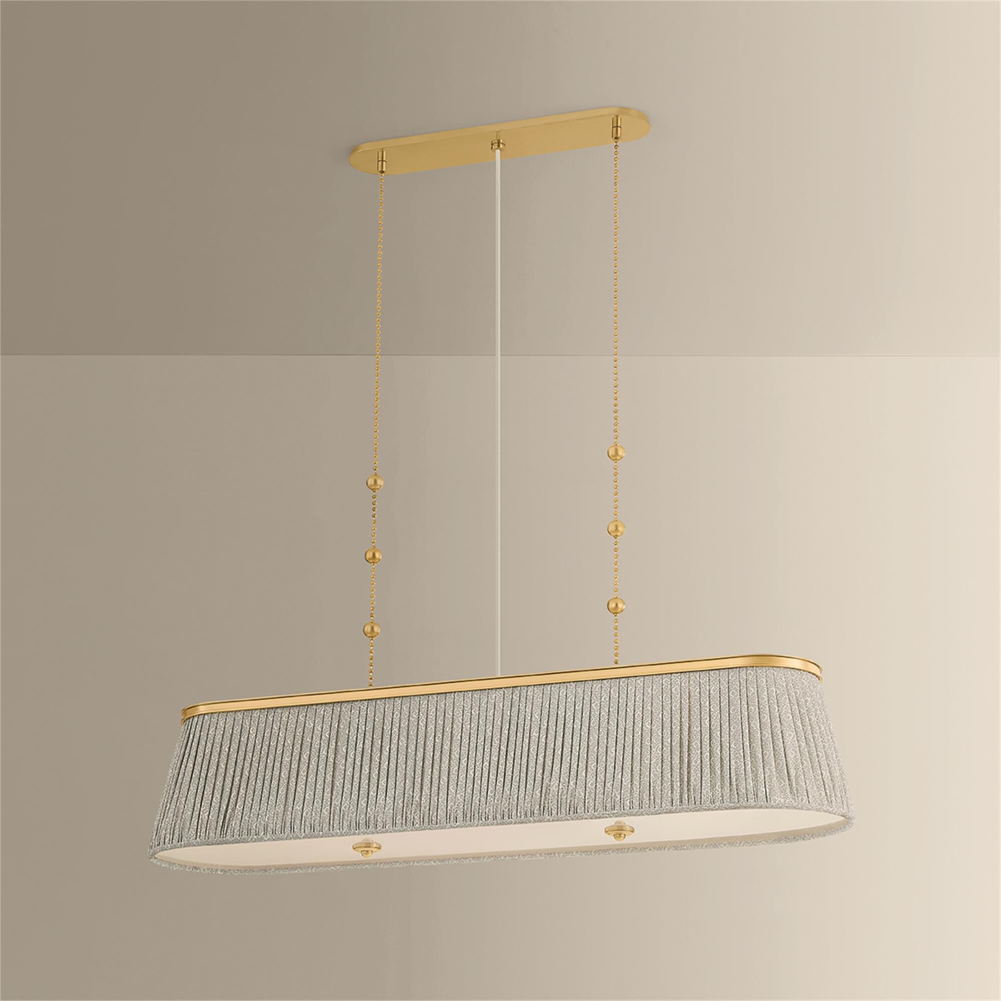 Shown in Aged Brass finish and Gathered Printed Cotton shade
