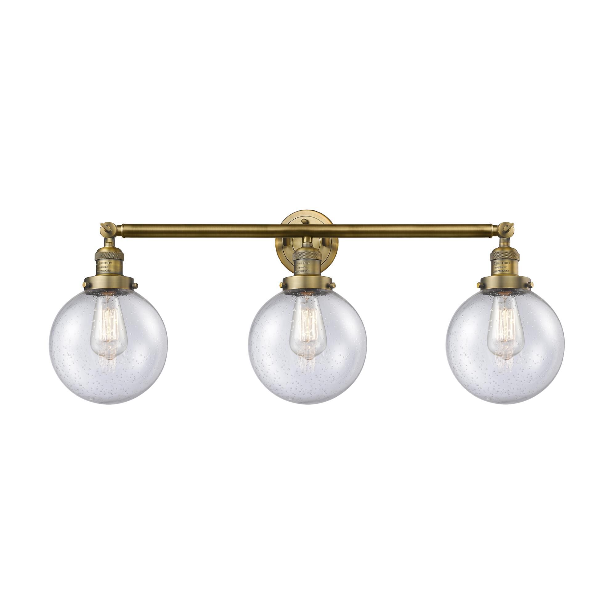 Shown in Brushed Brass finish and Seedy Beacon glass