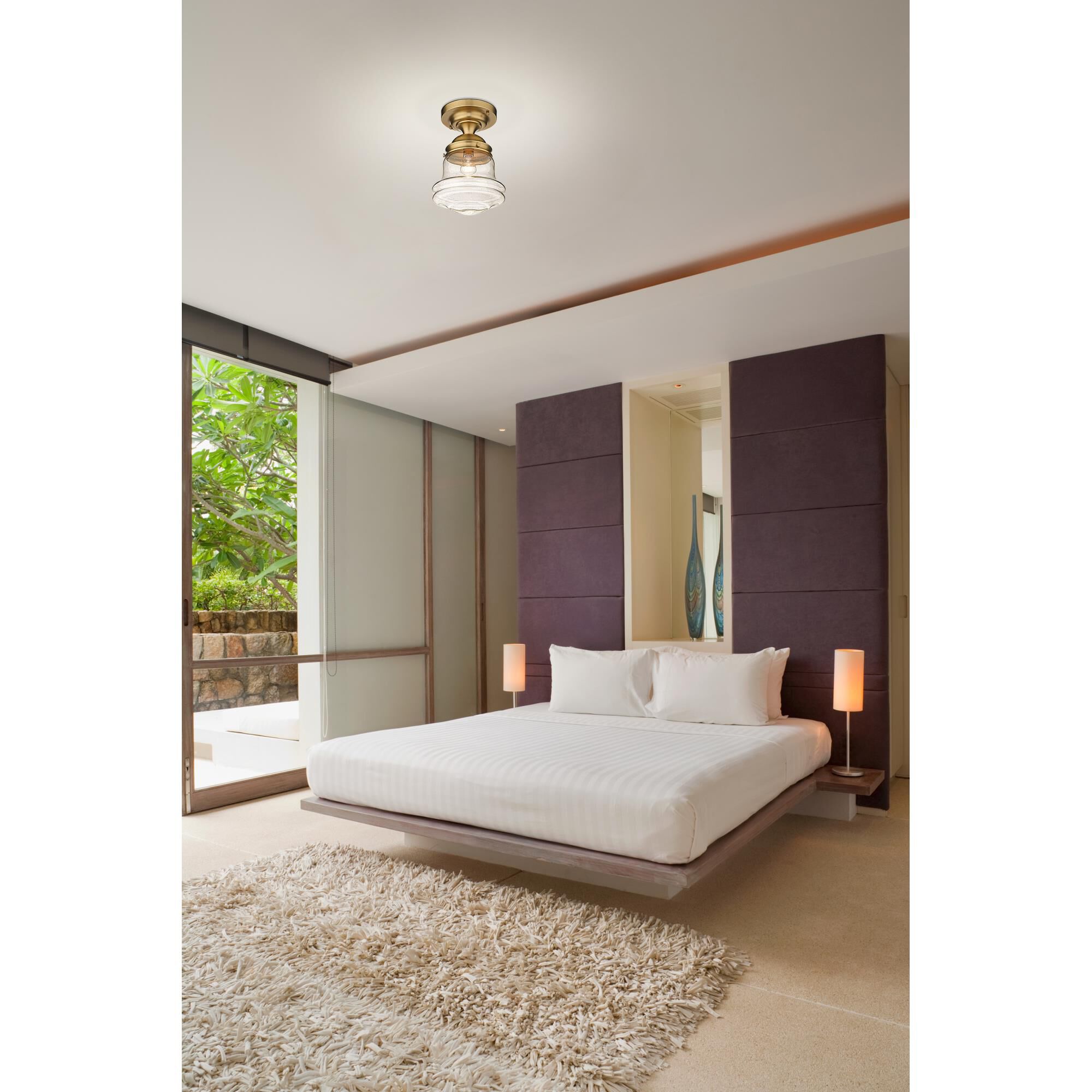 Shown in Heritage Brass finish and Clear Seedy glass and Clear Seedy shade