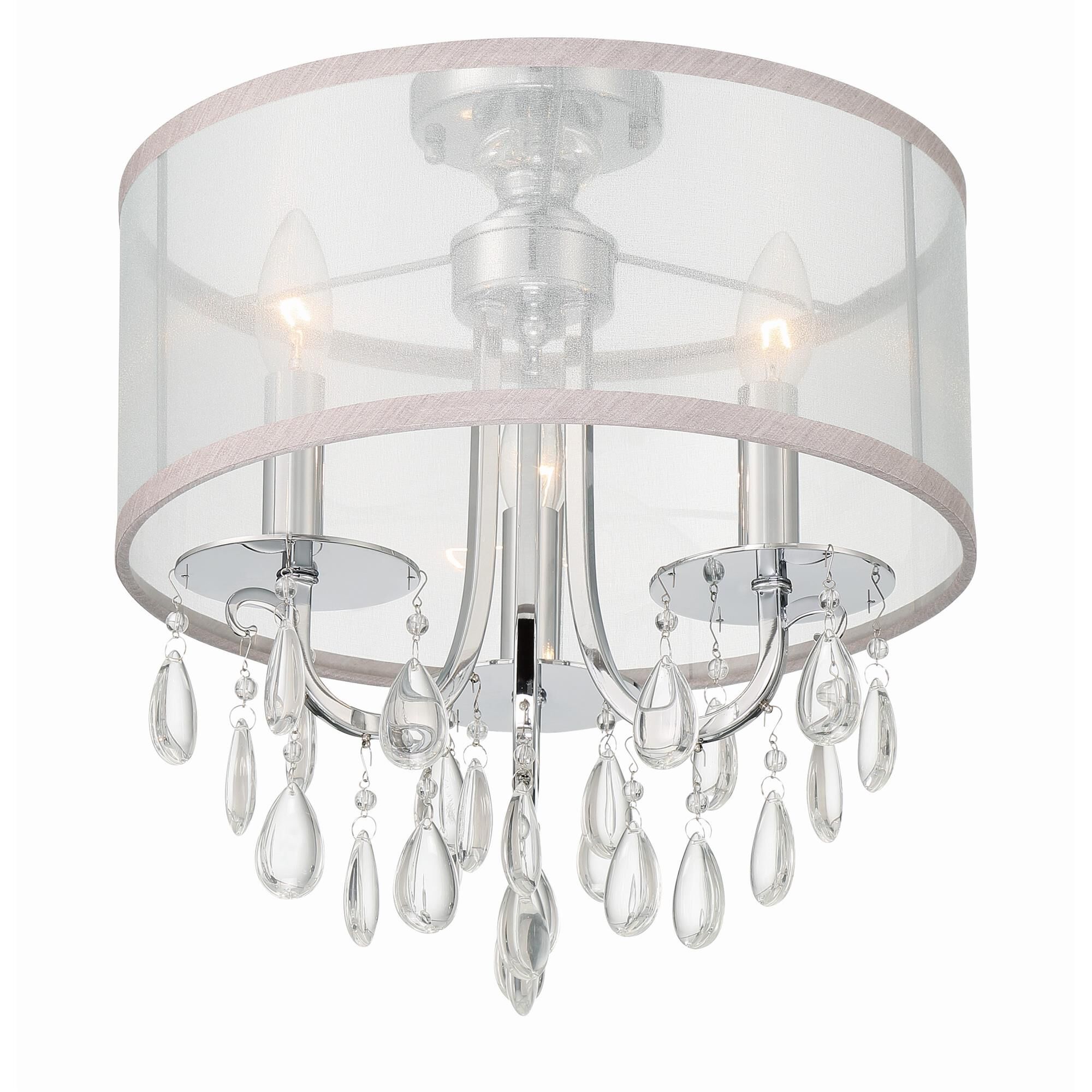 Shown in Polished Chrome finish and Clear Teardrop Almond crystal and Silk glass and Translucent Silver shade