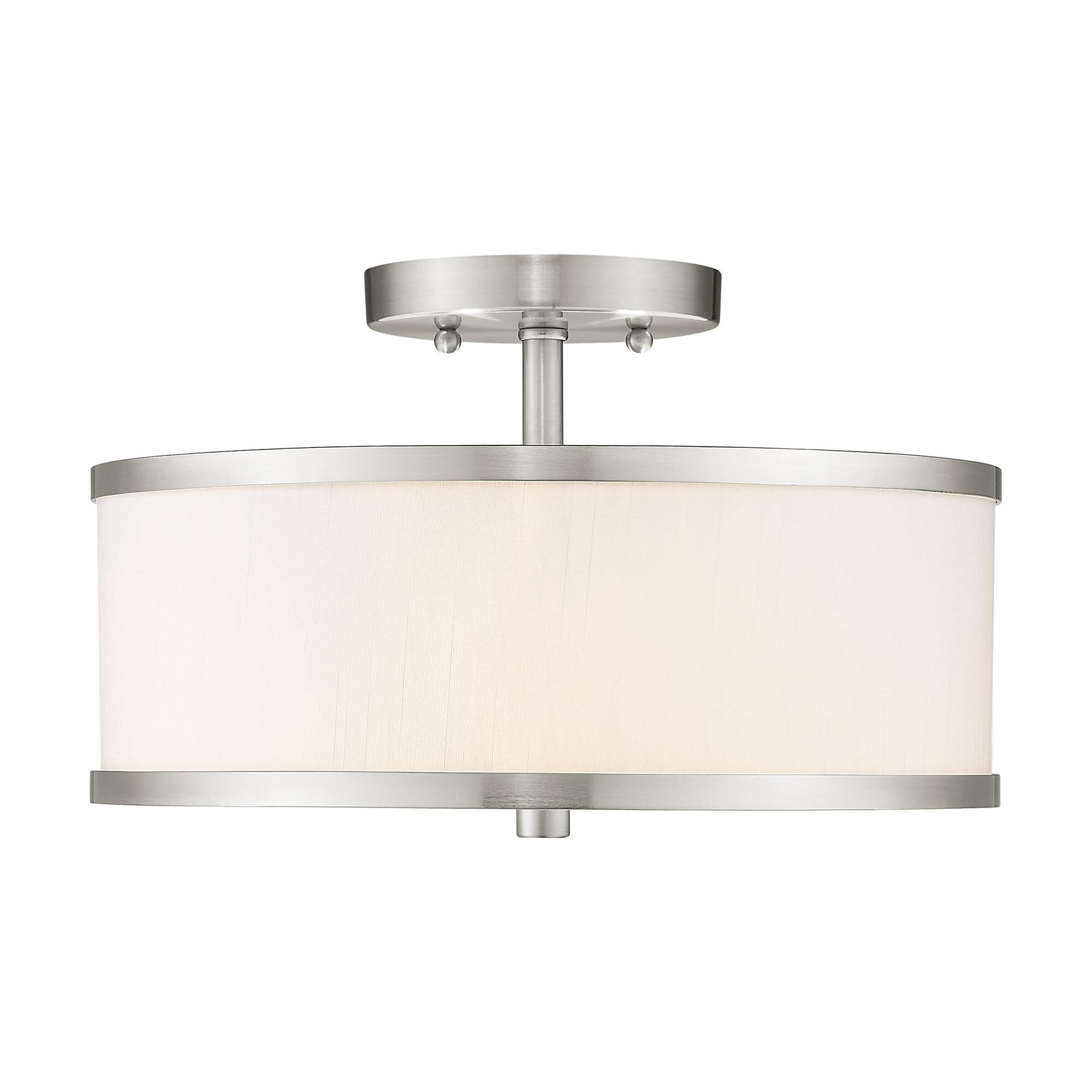 Shown in Brushed Nickel finish and Hand Crafted Off-White Fabric Hardback shade