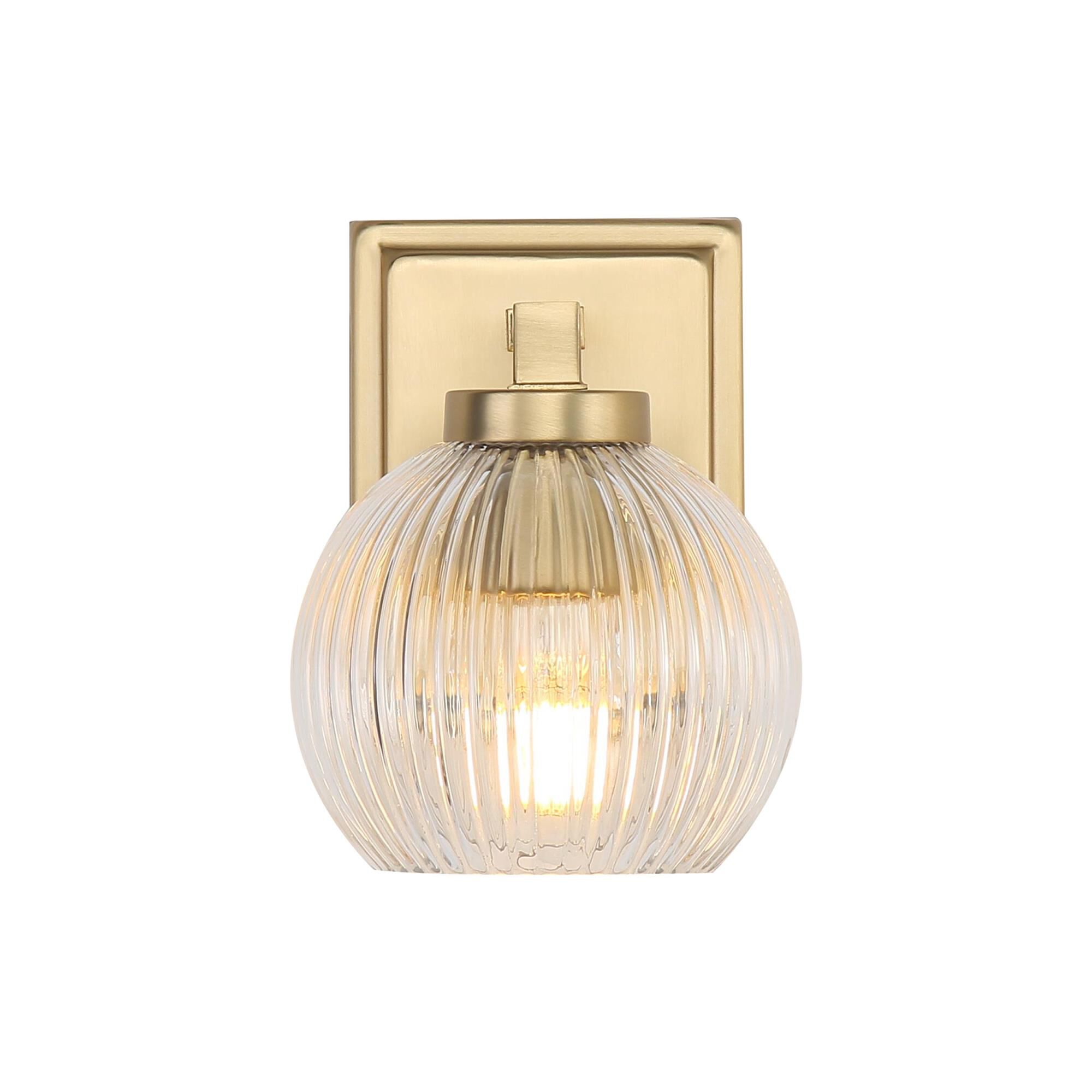 Shown in Brushed Champagne Bronze finish and Ribbed Clear Glass shade