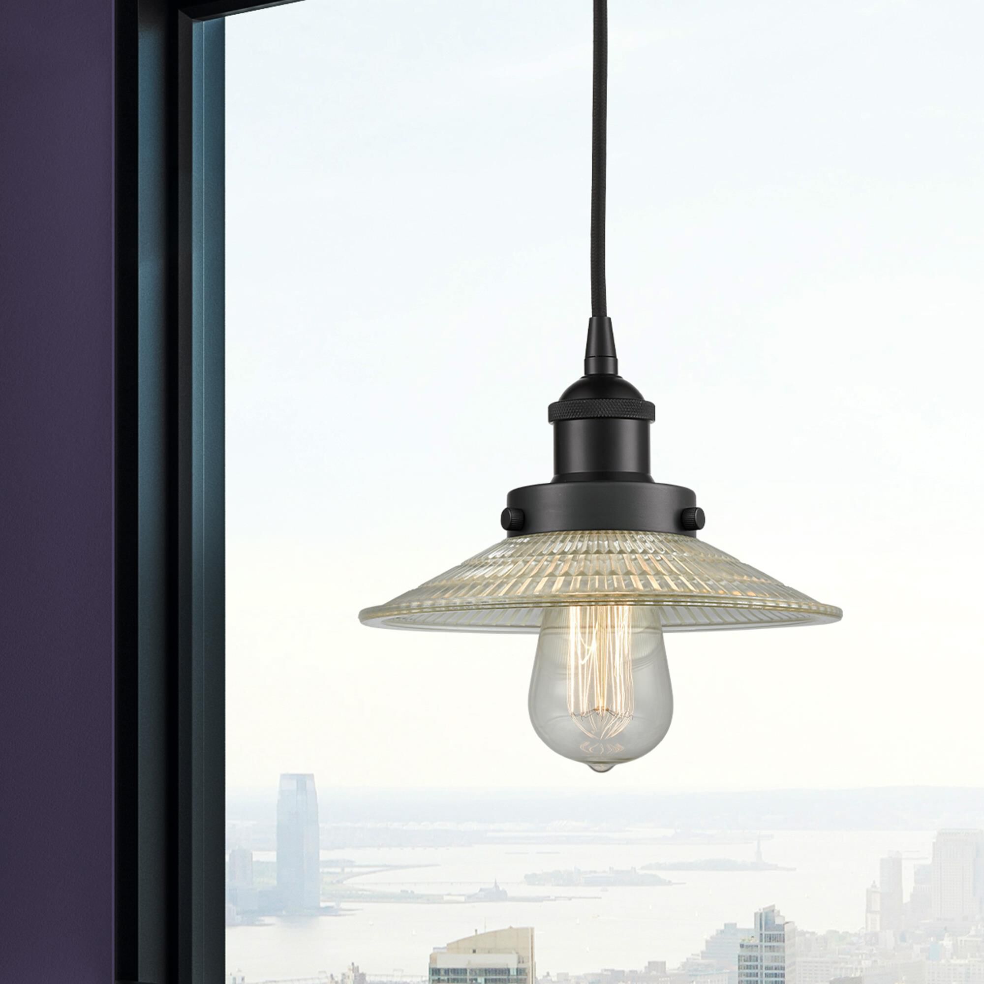 Shown in Matte Black finish and Clear glass